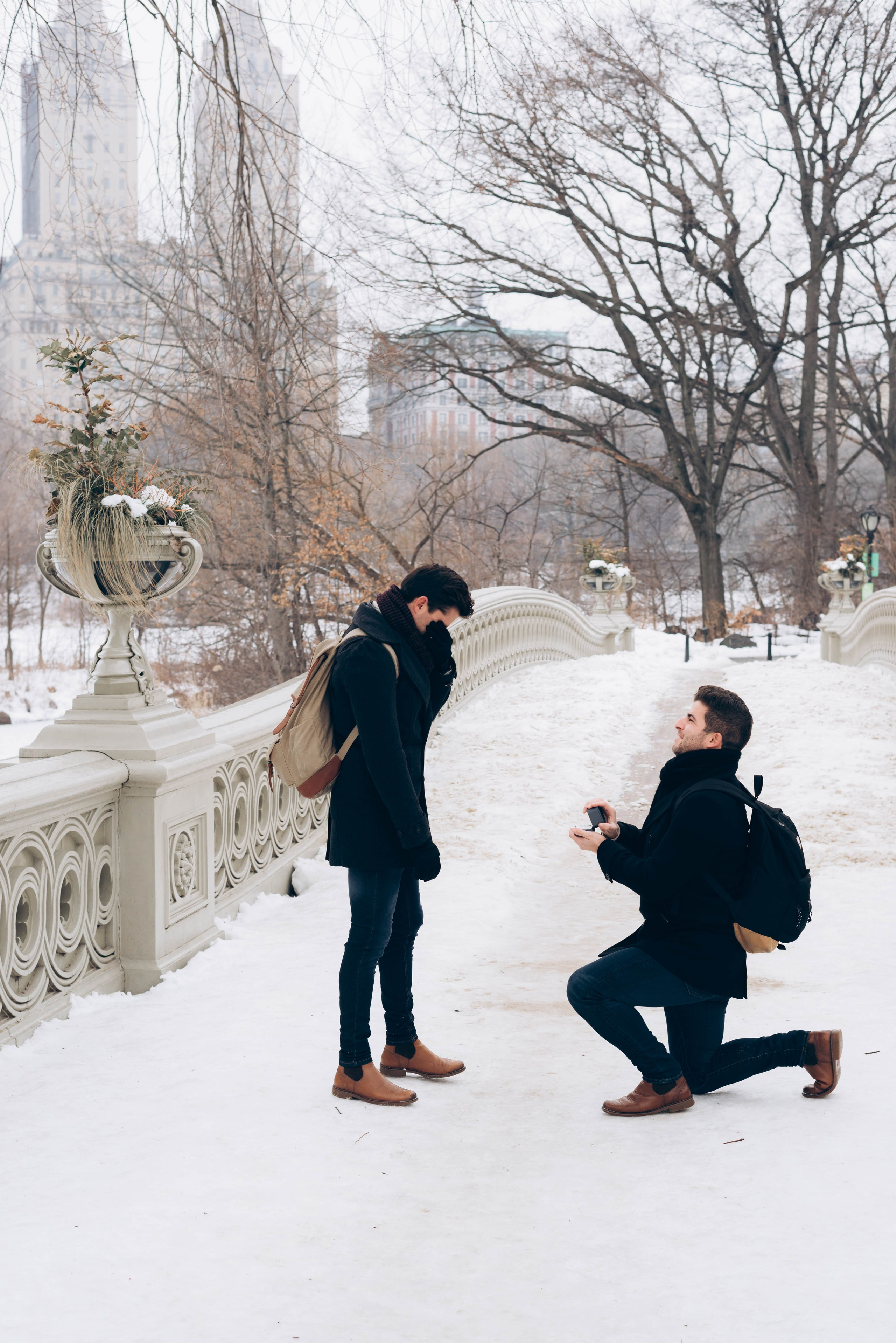 Proposal moment at Empire State Building rooftop.