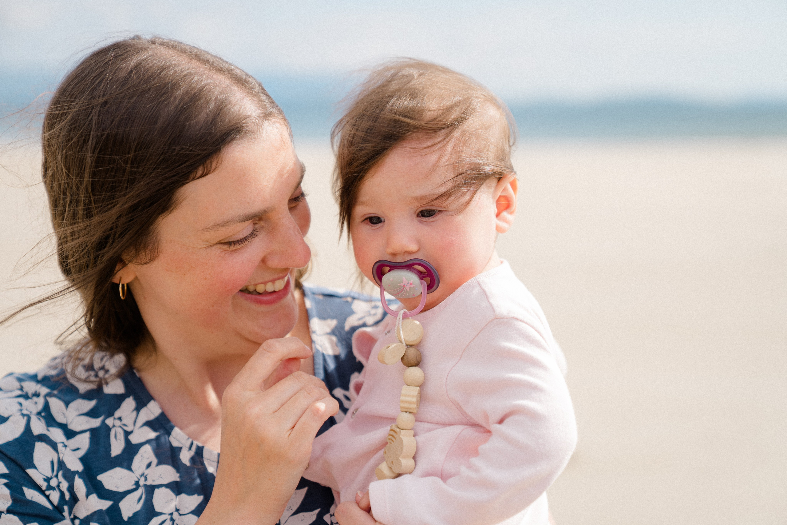 Darya and Mia at the ocean. Wedding and family photographer Ireland