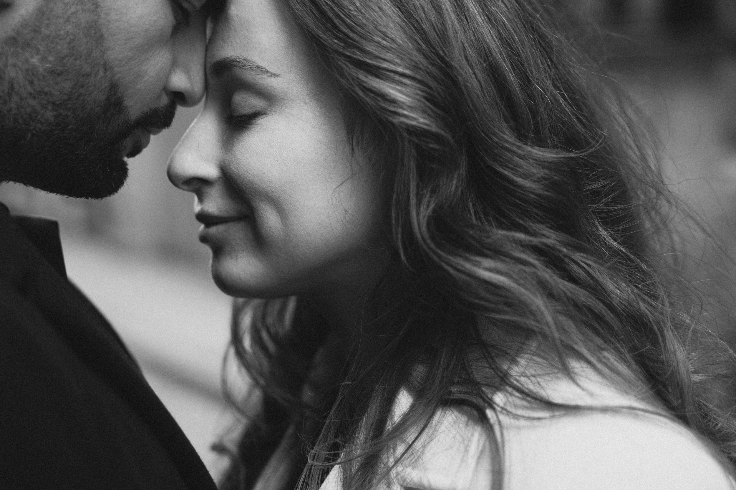 Close intimate portrait of couple in Old Montreal street