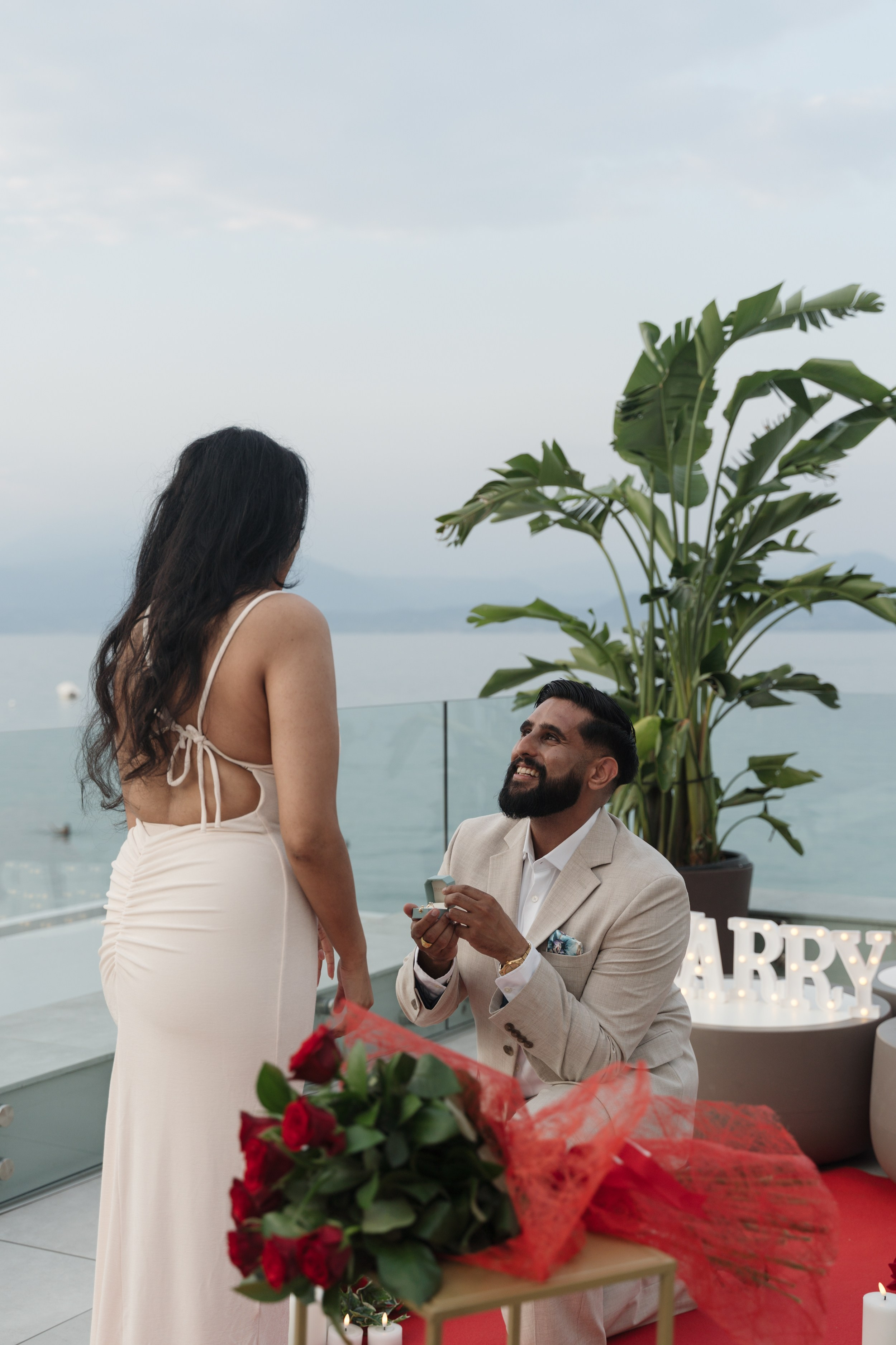 Lake Garda Rooftop Proposal. Lake Como Proposal Photographer | Surprise Proposals & Engagements