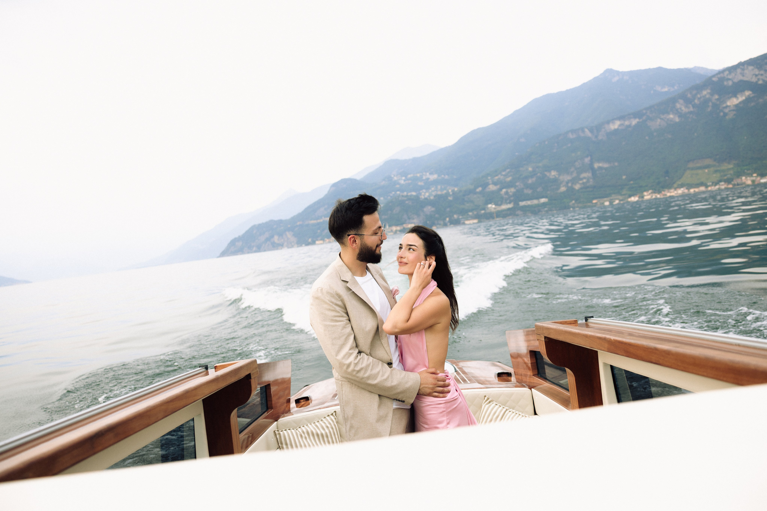 Couple enjoying a private boat ride on Lake Como