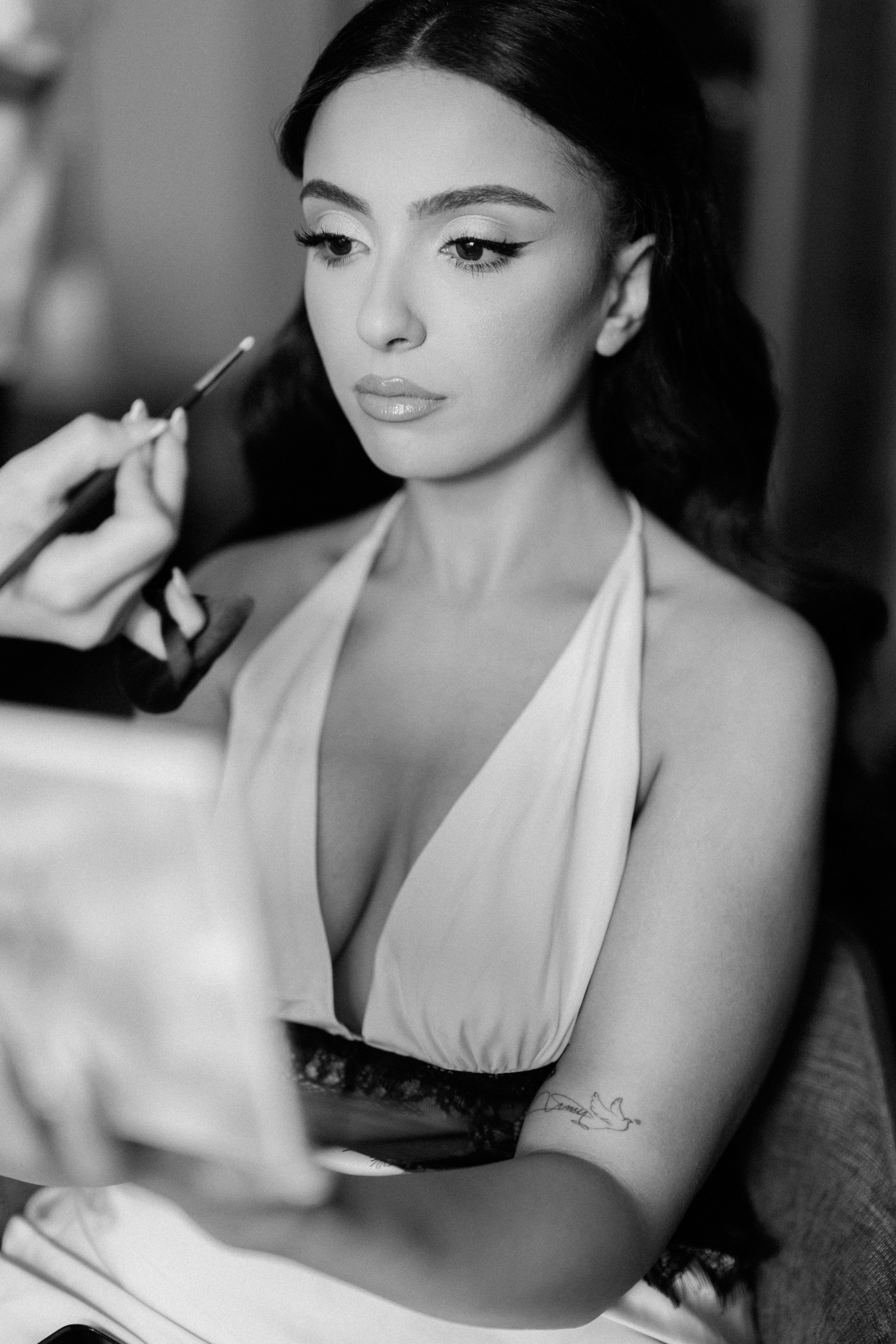Black and white bridal portrait with veil and soft expression