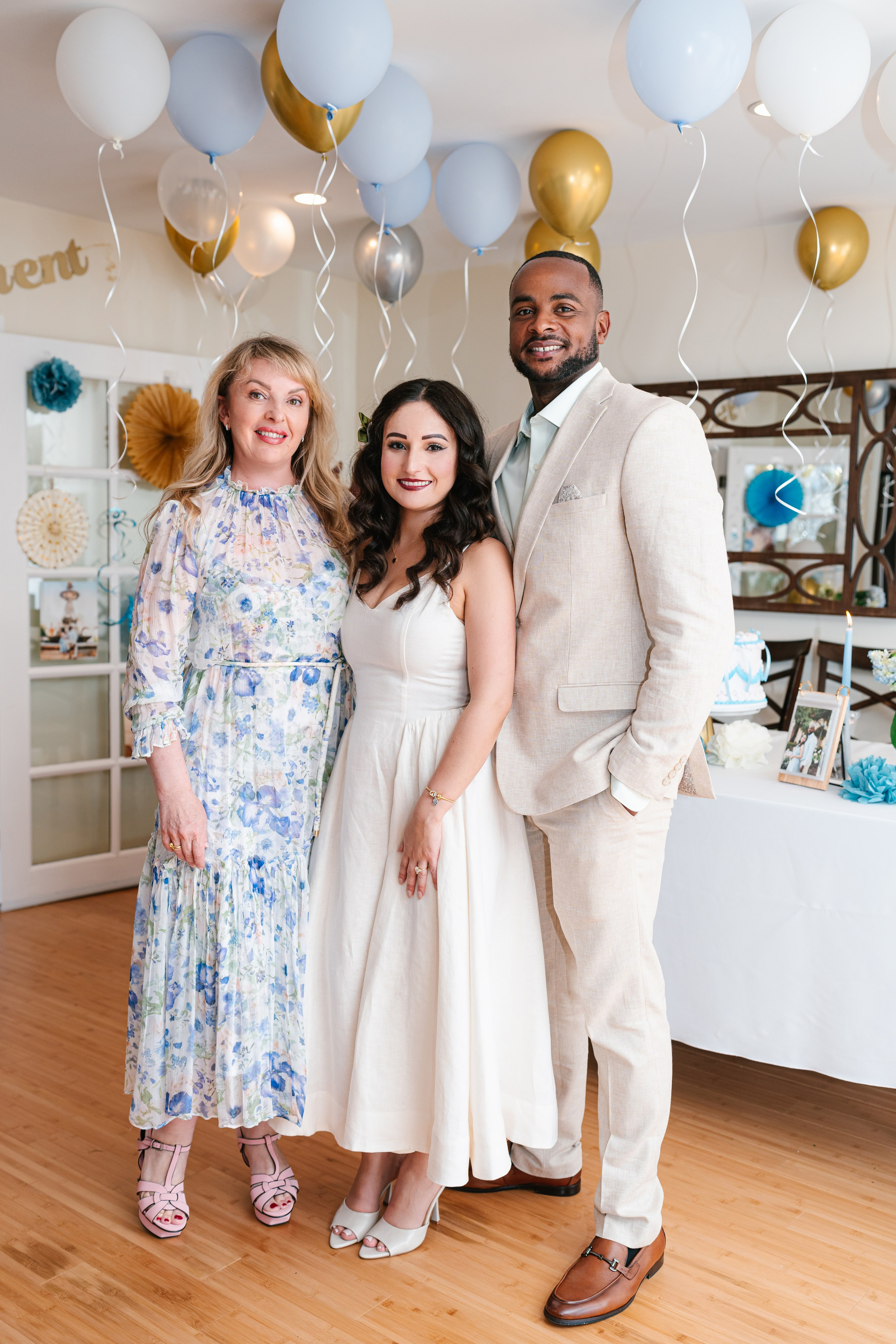 Romantic engagement celebration at home surrounded by family members
