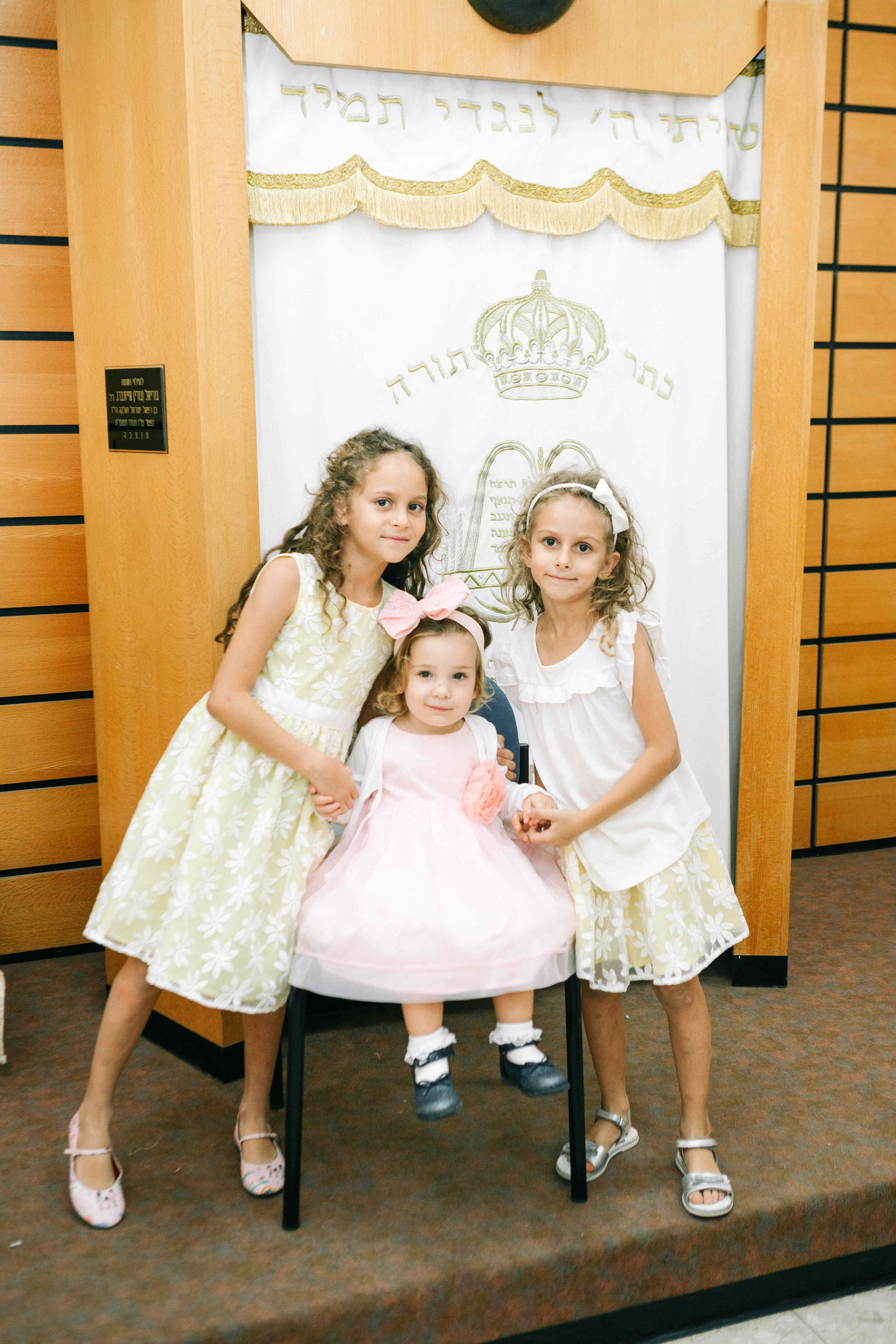 BRITH MILA IN THE SMALL SYNAGOGUE. PHOTOGRAPHER IN ISRAEL