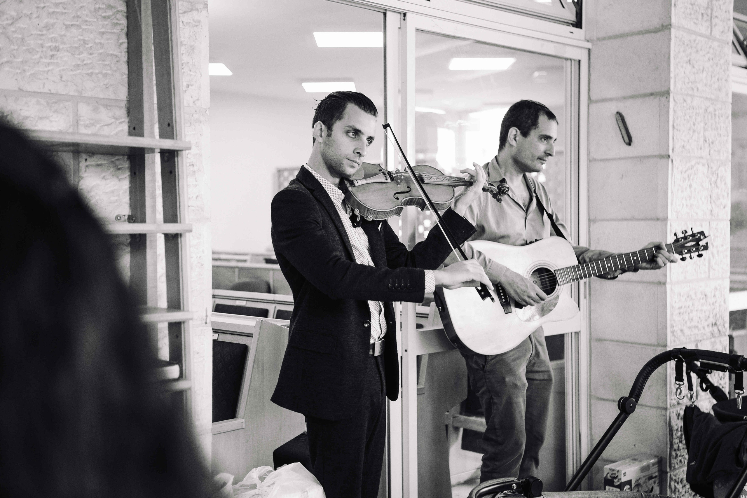 BRITH MILA IN THE SMALL SYNAGOGUE. PHOTOGRAPHER IN ISRAEL