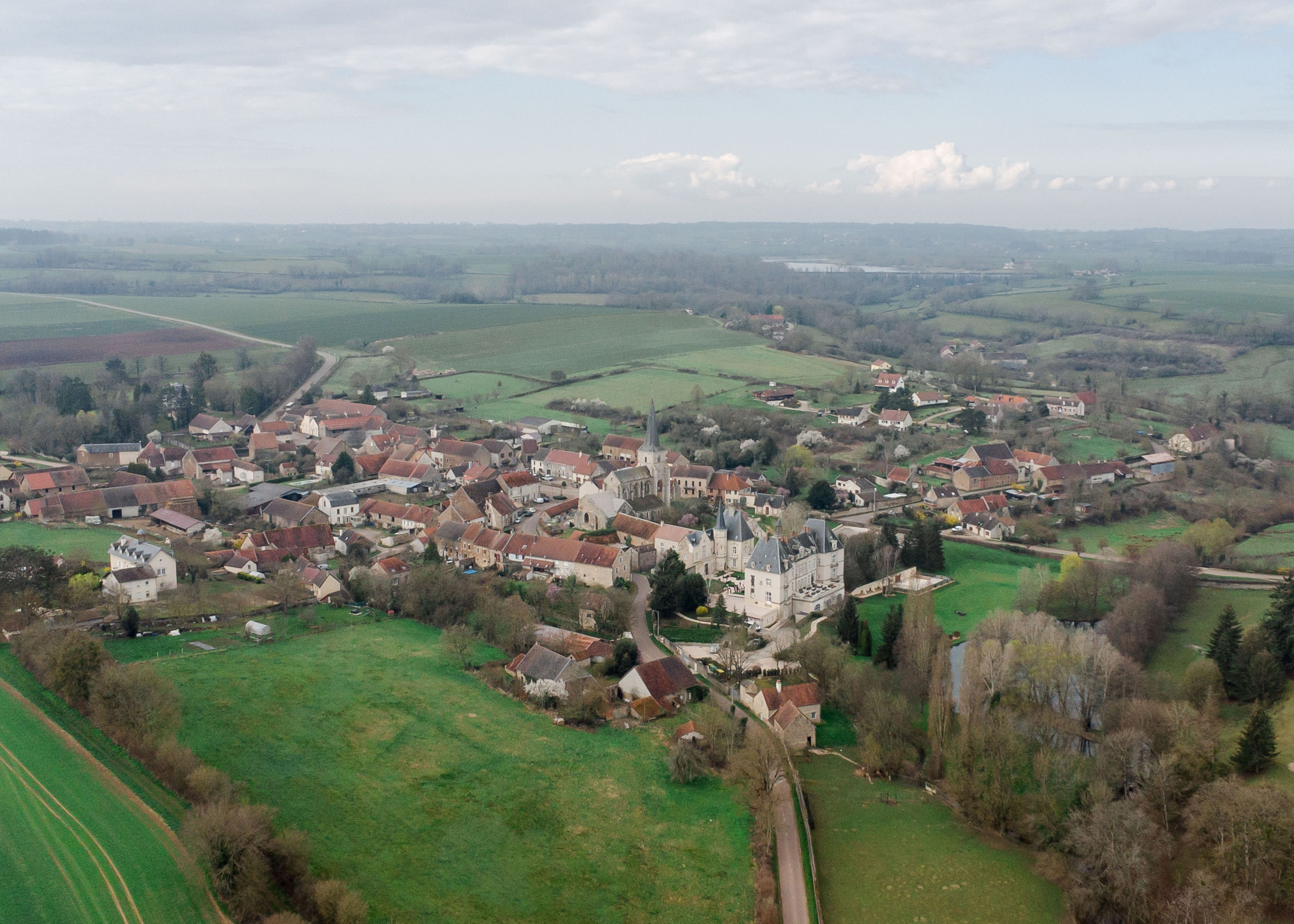 Stunning wedding chateau in France with lush greenery and a breathtaking view, perfect for ceremonies.