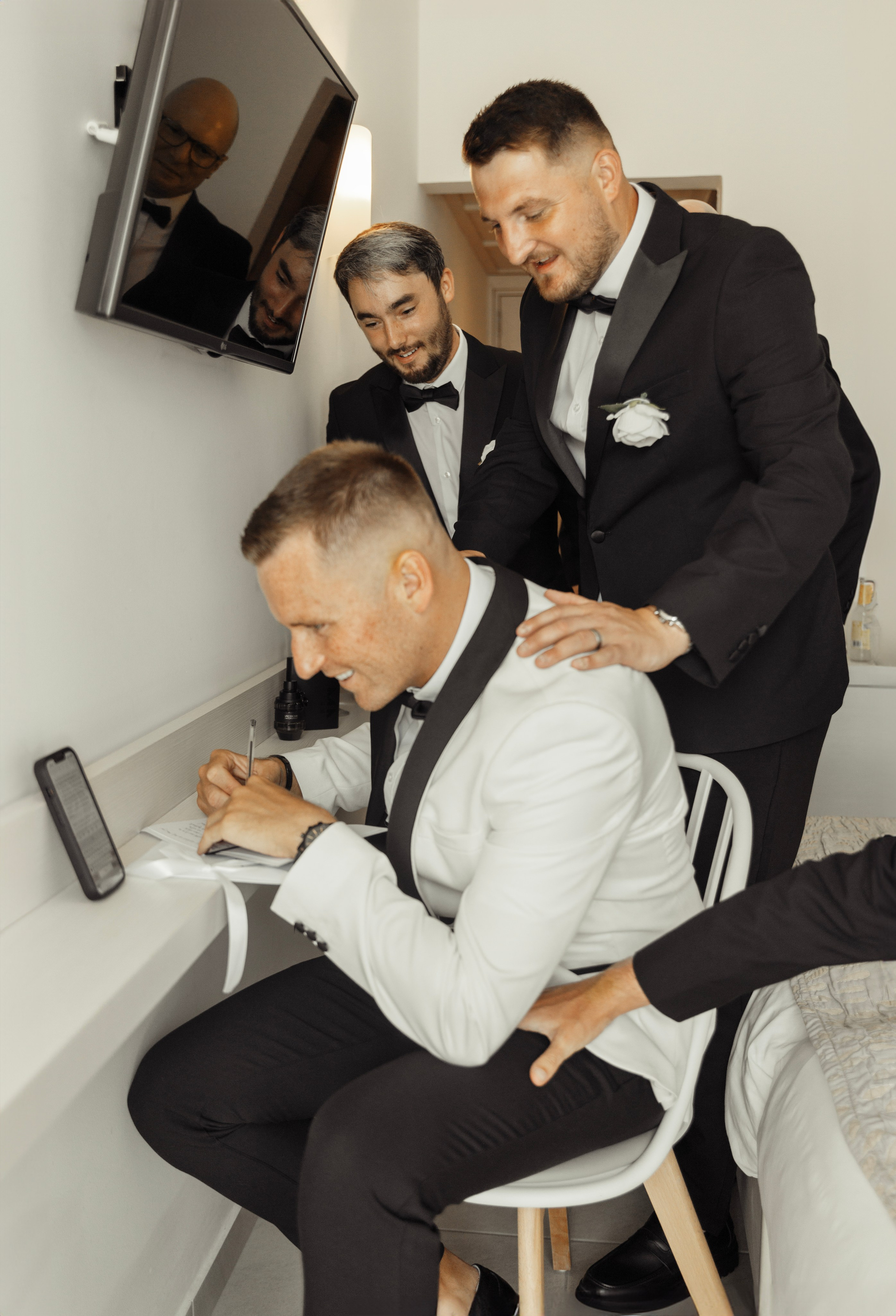 The groom writes a vow to the bride before the ceremony. Rhodes, Greece