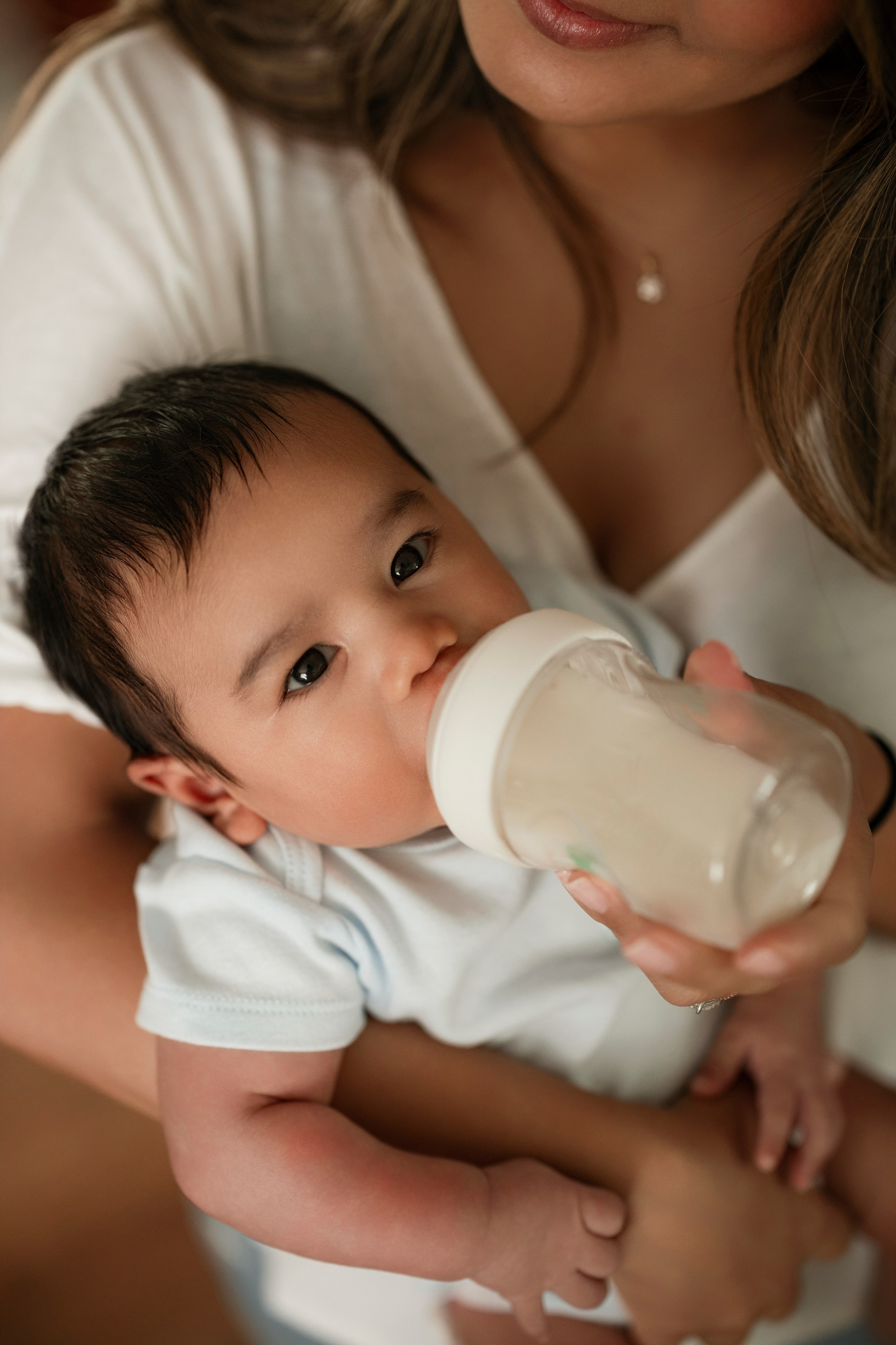 At-home family photography capturing newborn’s first weeks