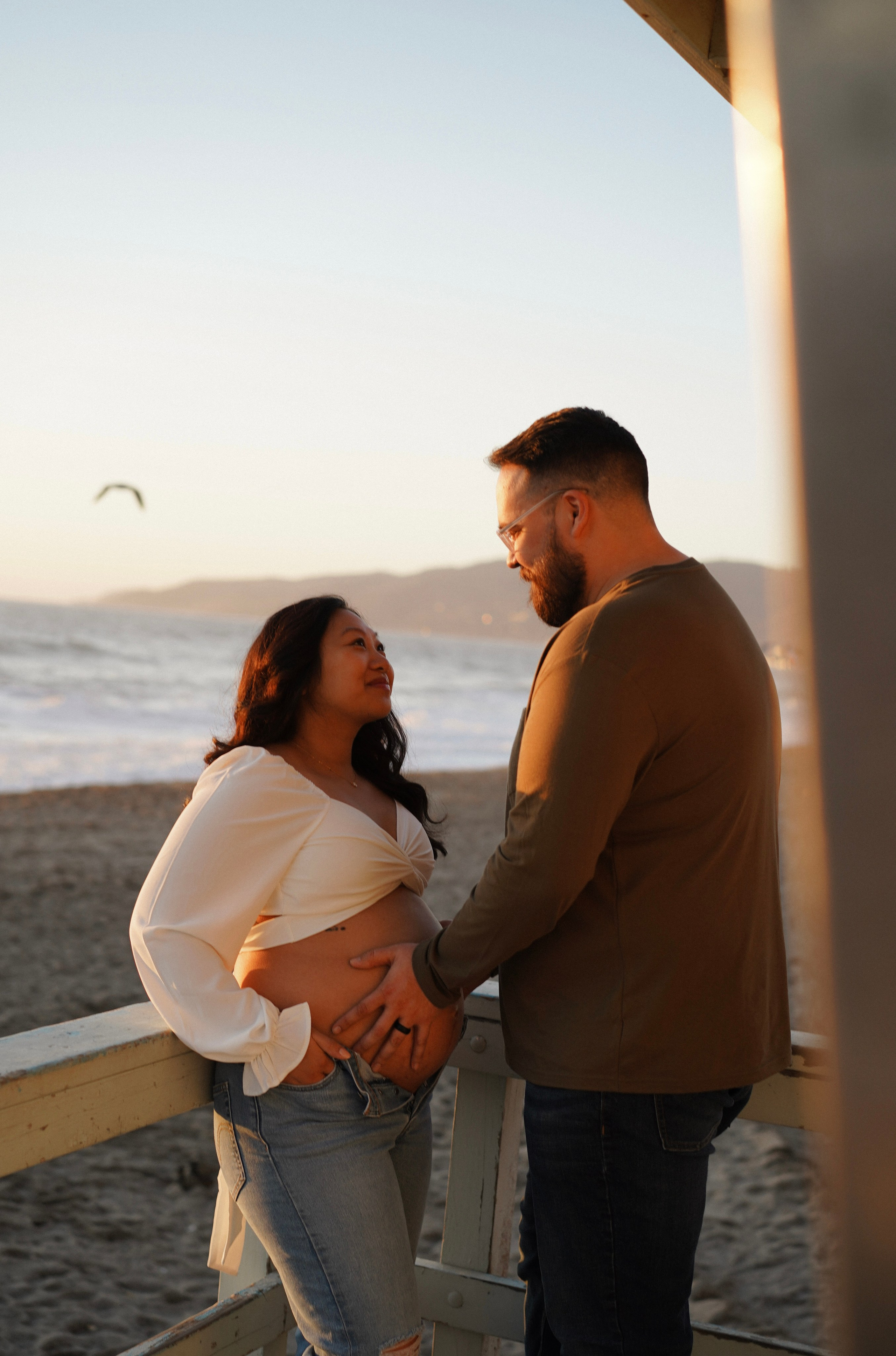 Family photoshoot. Family photoshoot outside. Beach photoshoot. Family holiday photoshoot. Sunset photoshoot. Pregnancy photoshoot. Maternity photoshoot.