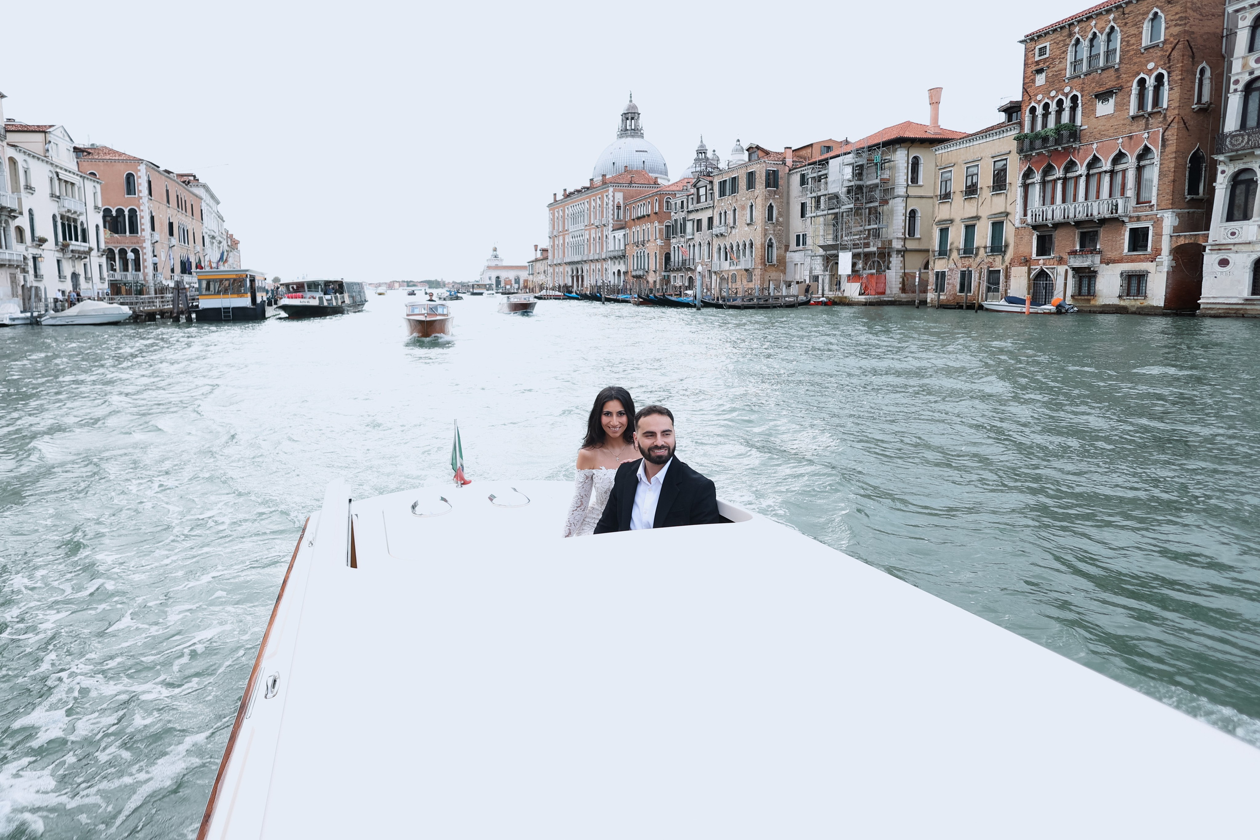 Couple in a water taxi on the Grand Canal