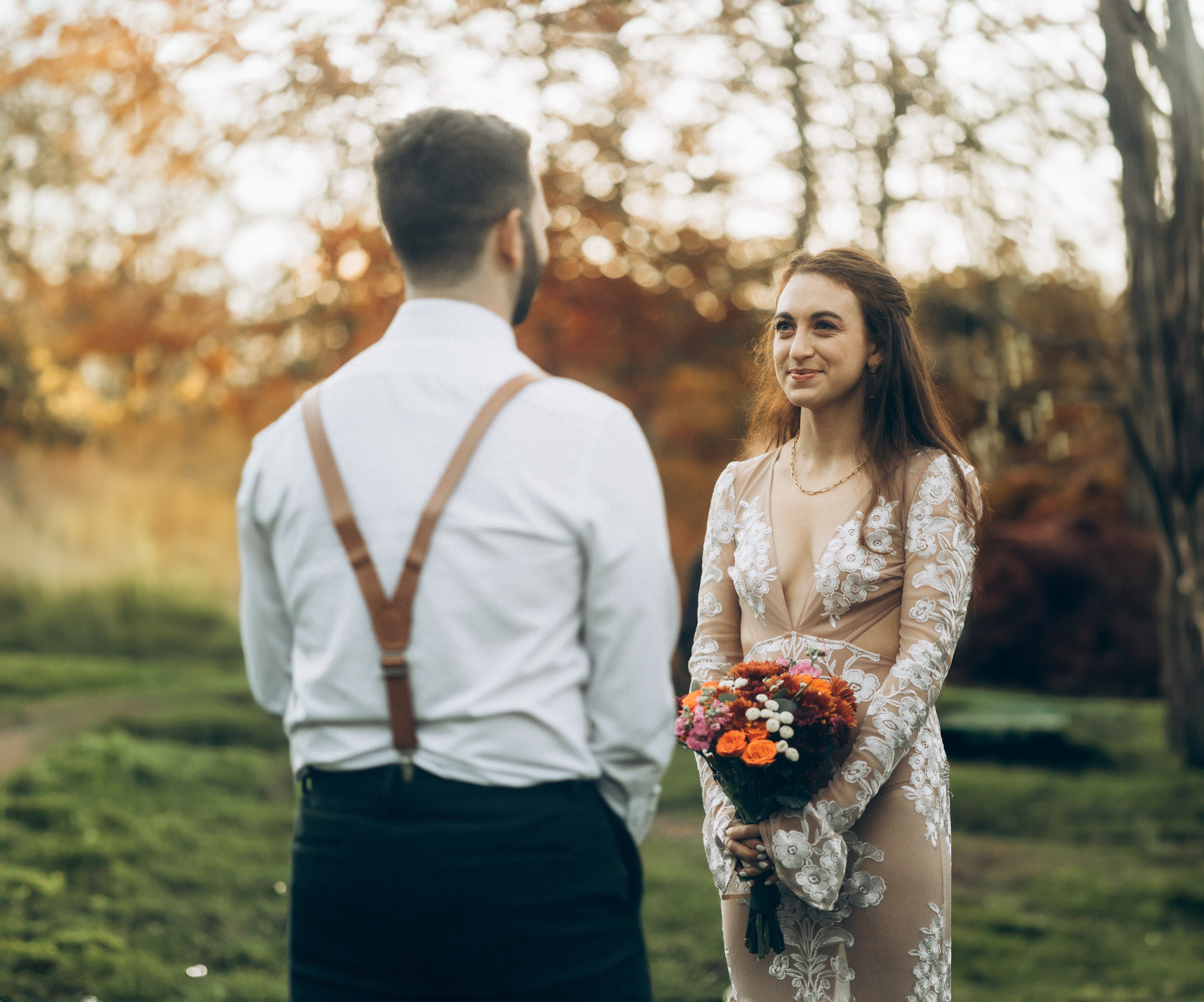 Elegant outdoor wedding photography capturing emotional first look moment in Upstate New York
