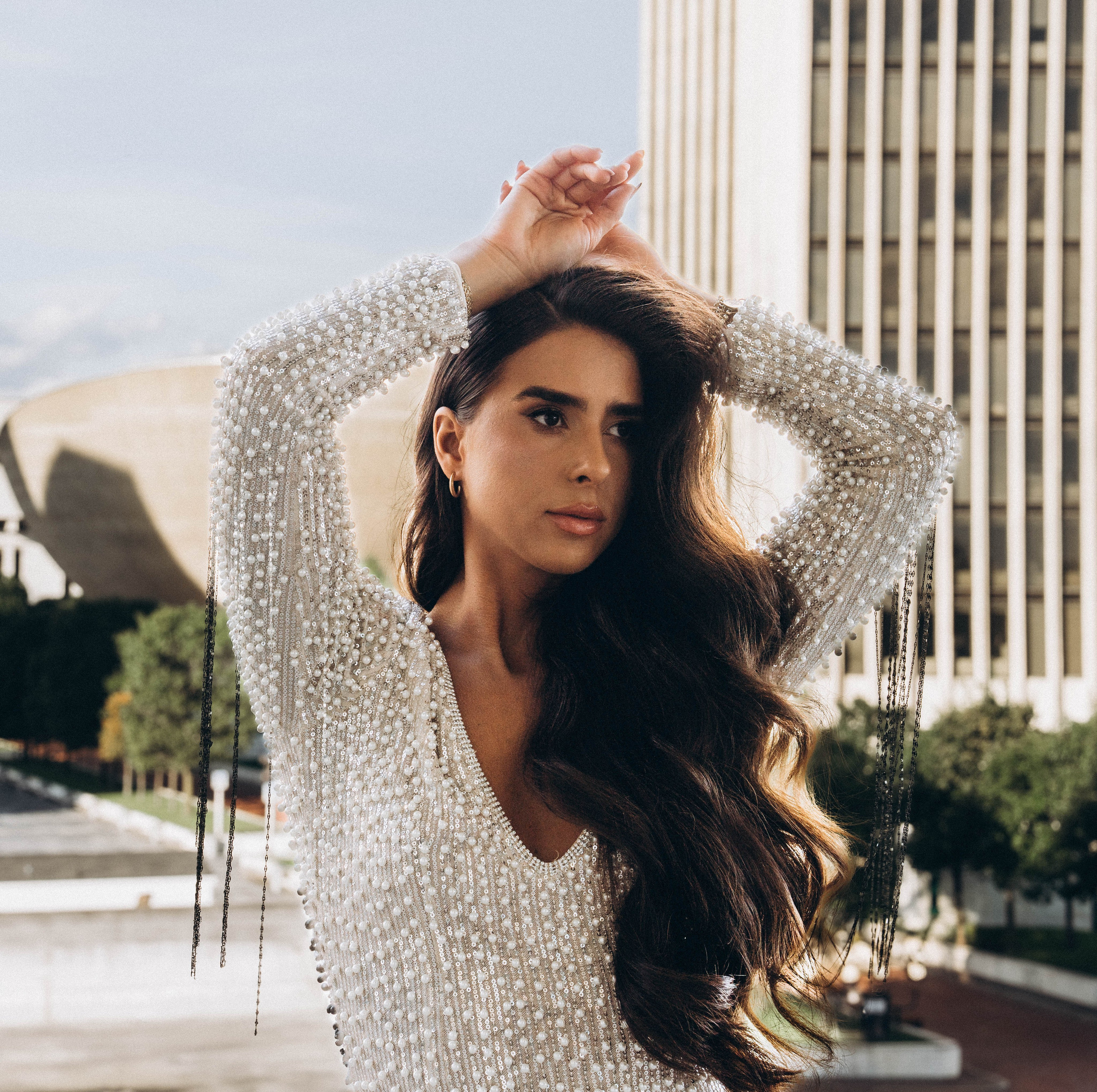 Bride walking in Malta’s open countryside.