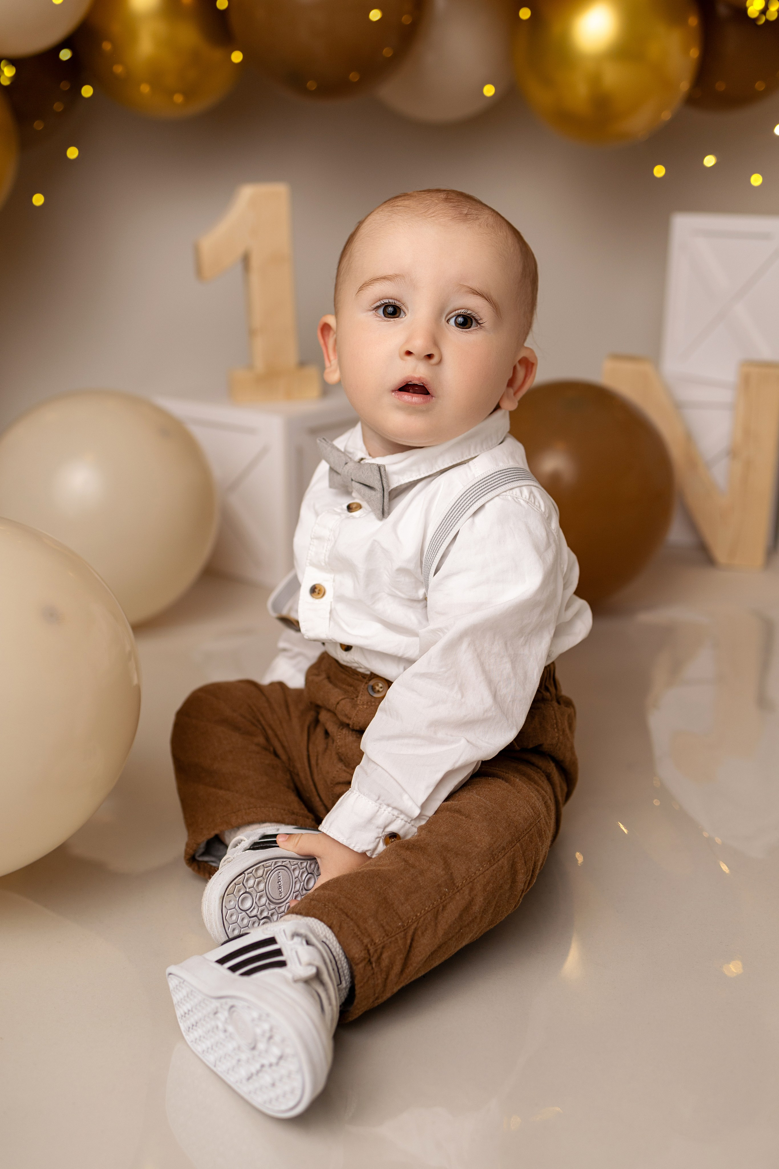 Erste Geburtstag „Cake Smash“. Neugeborene- Schwangerschaft- und Kinder Fotografin in Lehre