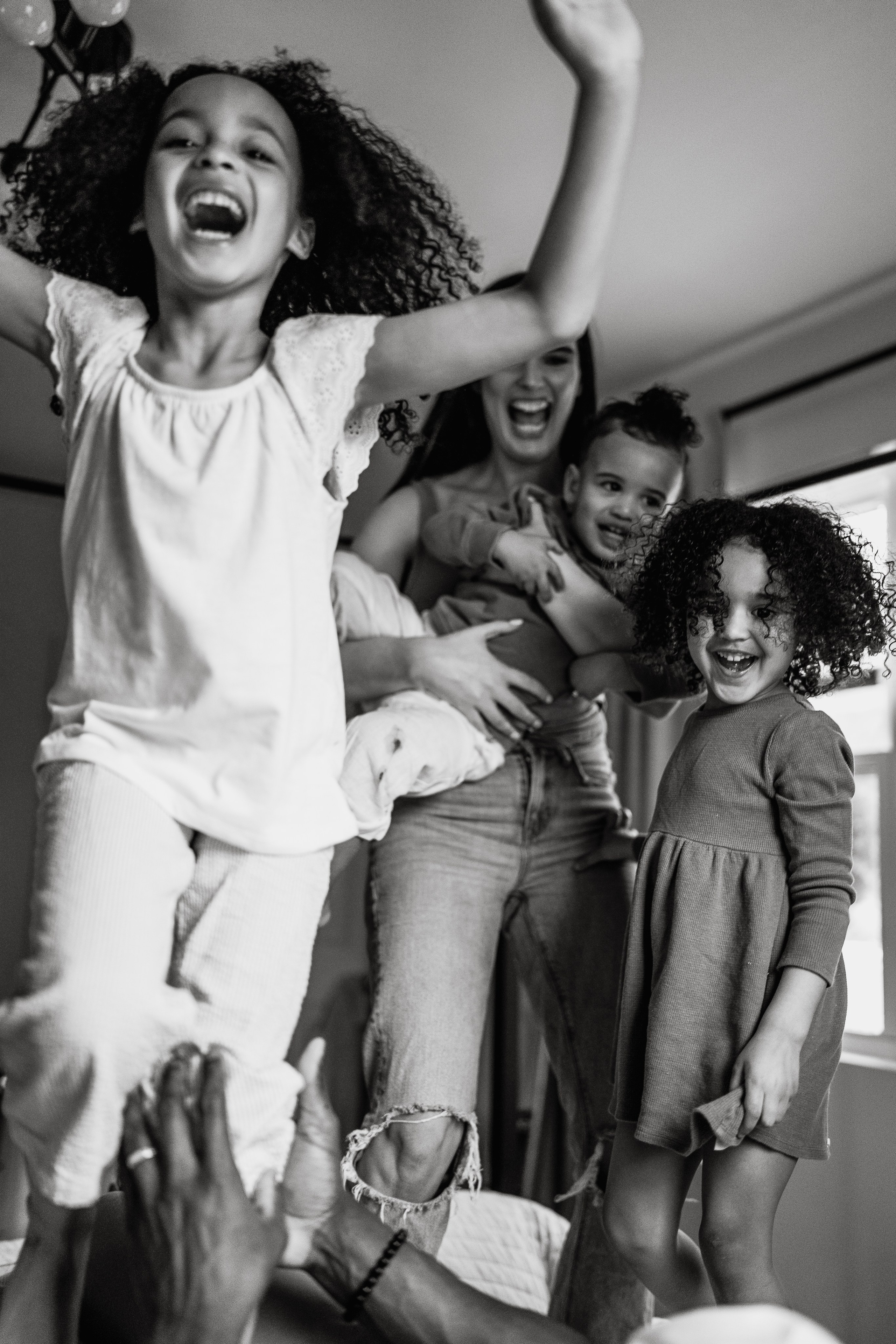 Stephanie, Lamar and kids at home. Wedding and family photographer and videographer PA, NJ, NY, DE, MD