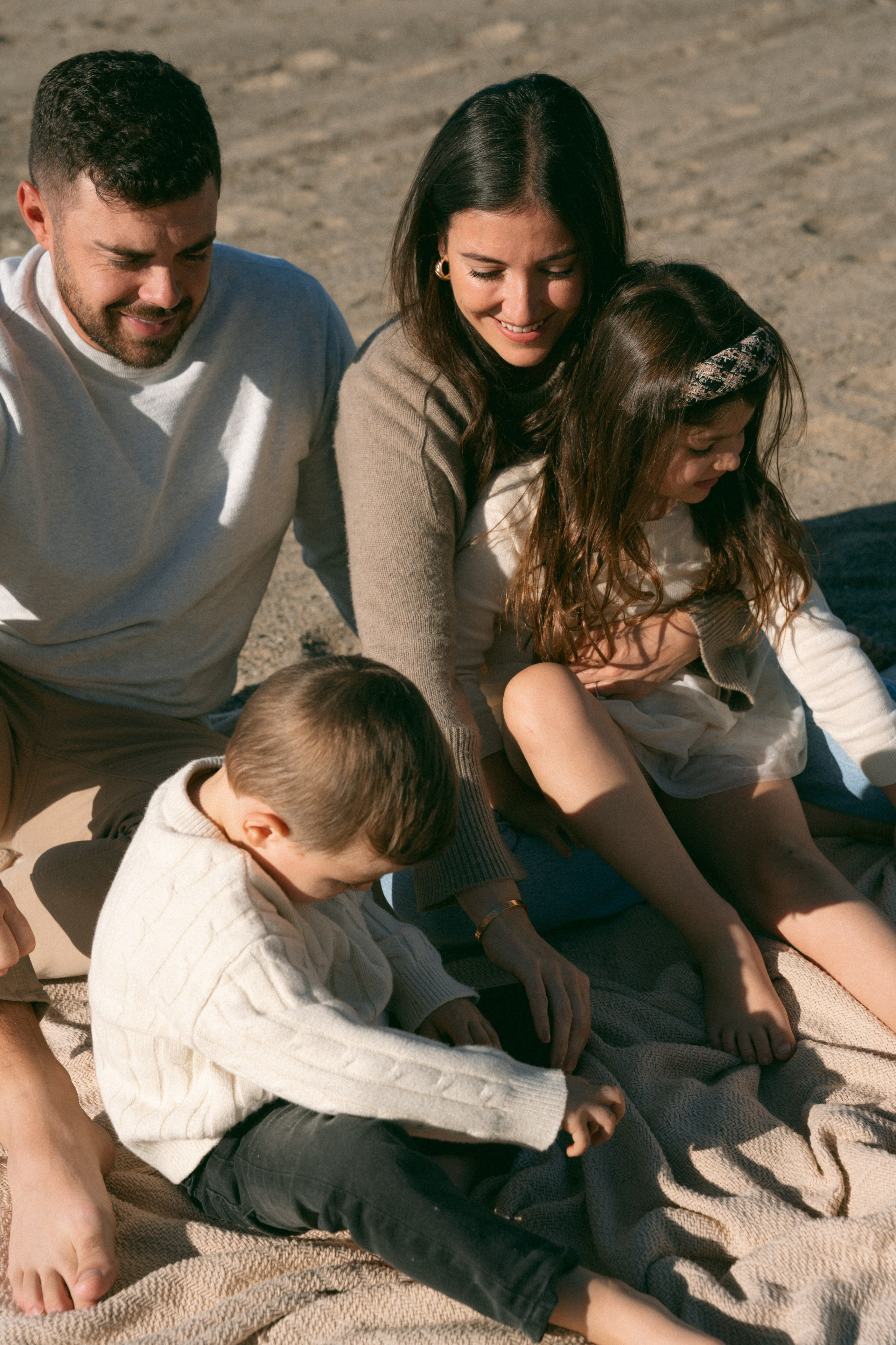 Family photoshoot. Family photoshoot outside. Beach photoshoot. Family holiday photoshoot. Sunset photoshoot