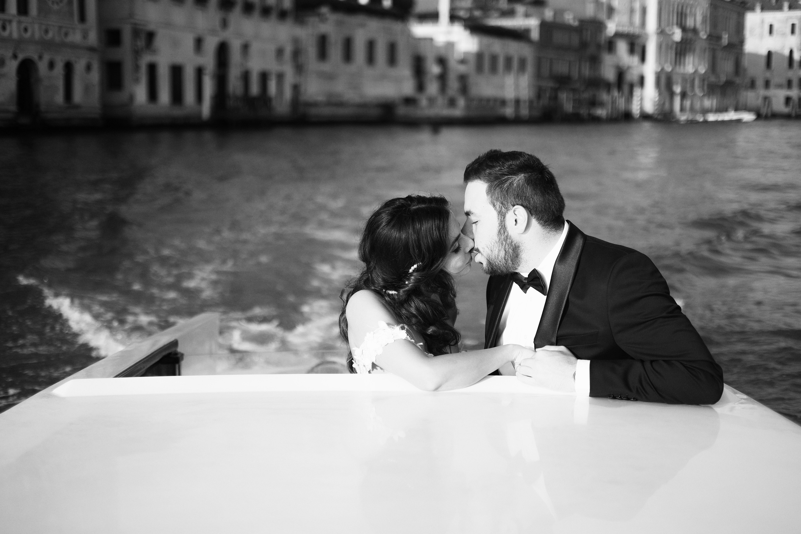Couple kissing on water taxi 