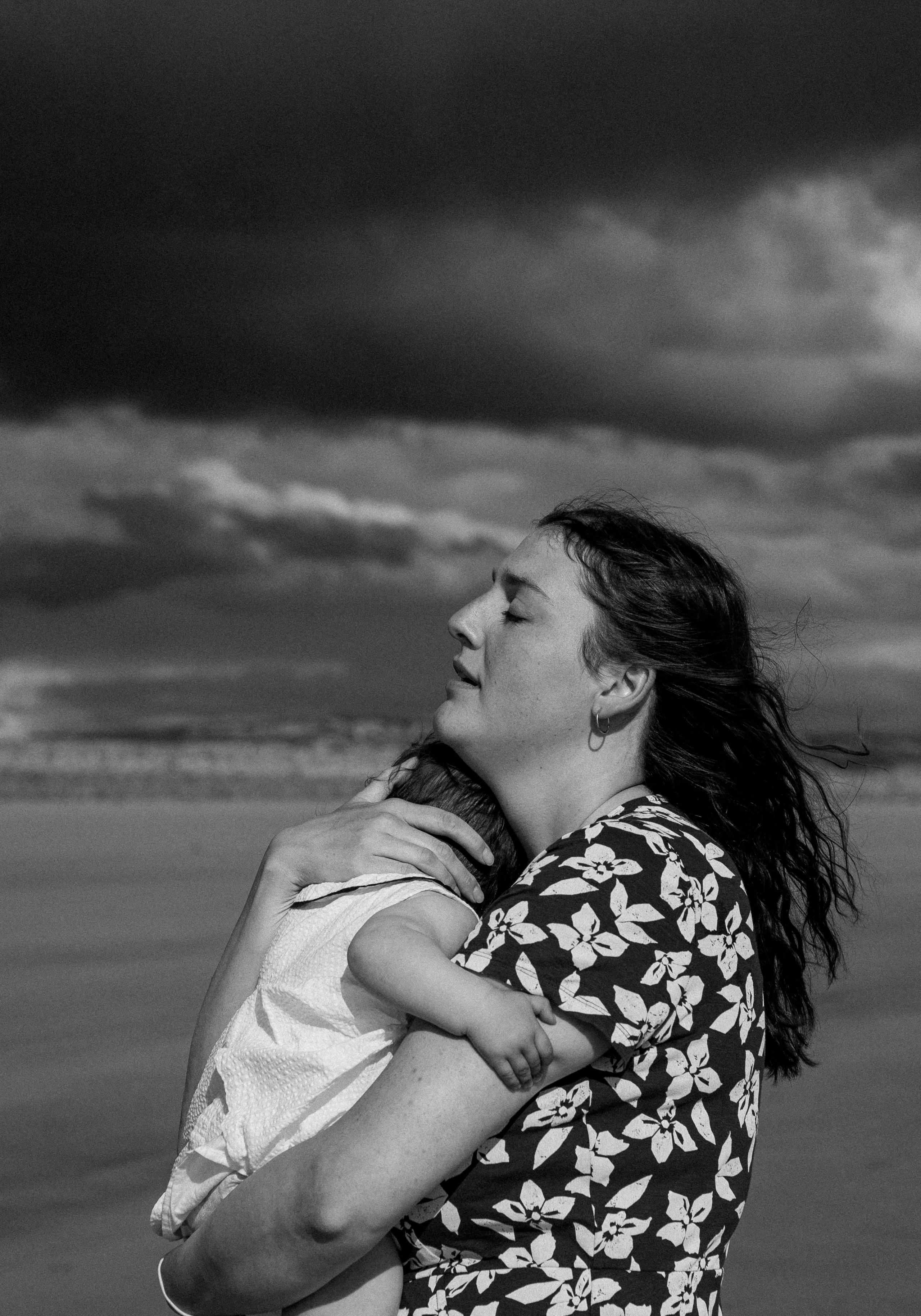 Darya and Mia at the ocean. Wedding and family photographer Ireland