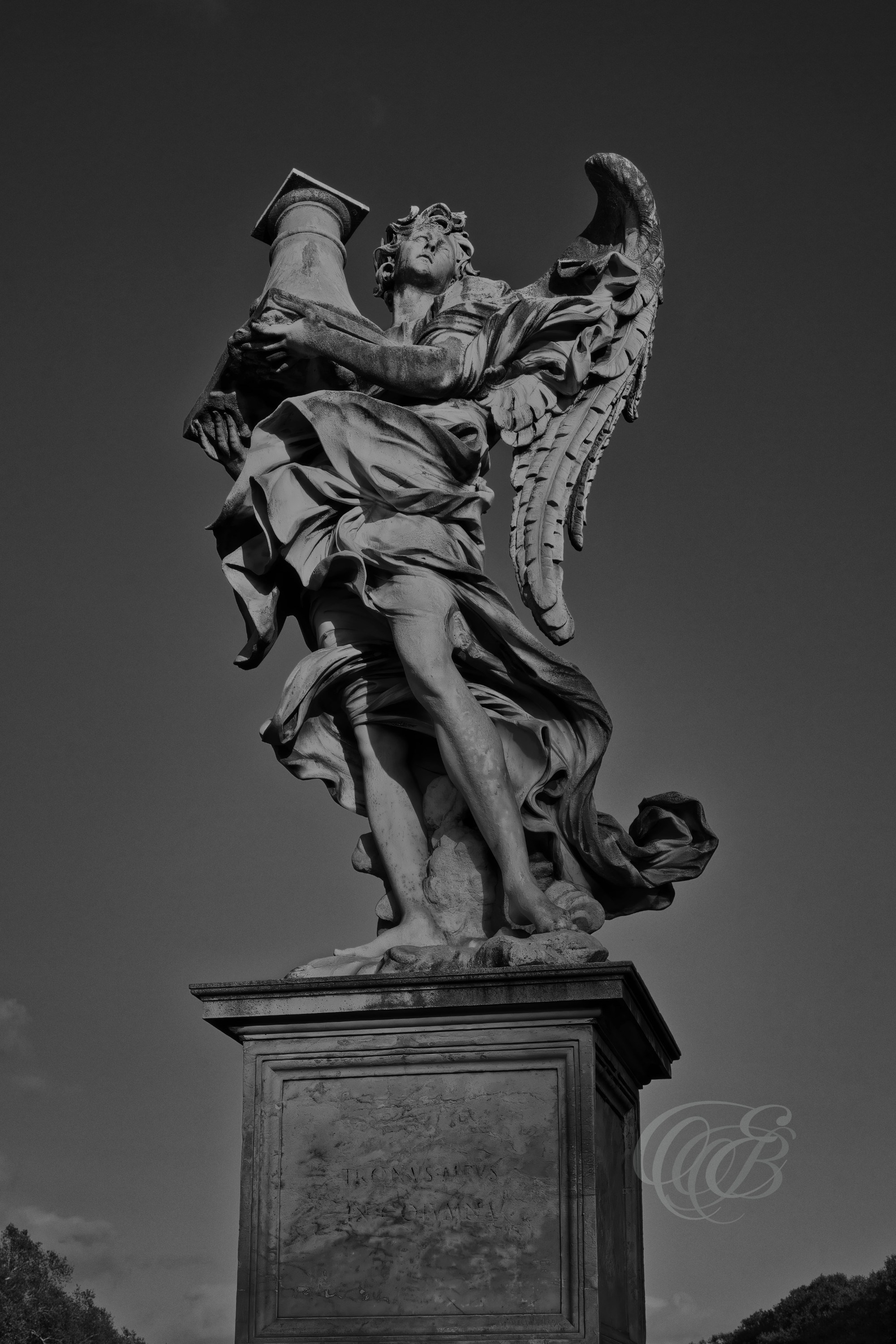 Rome Italy - Angel carrying the column - B&W - Eduardo Bartoli Fine Art Photography - Black and white fine art photograph of the angel carrying the column statue in Rome, Italy – photography by Eduardo Bartoli.
