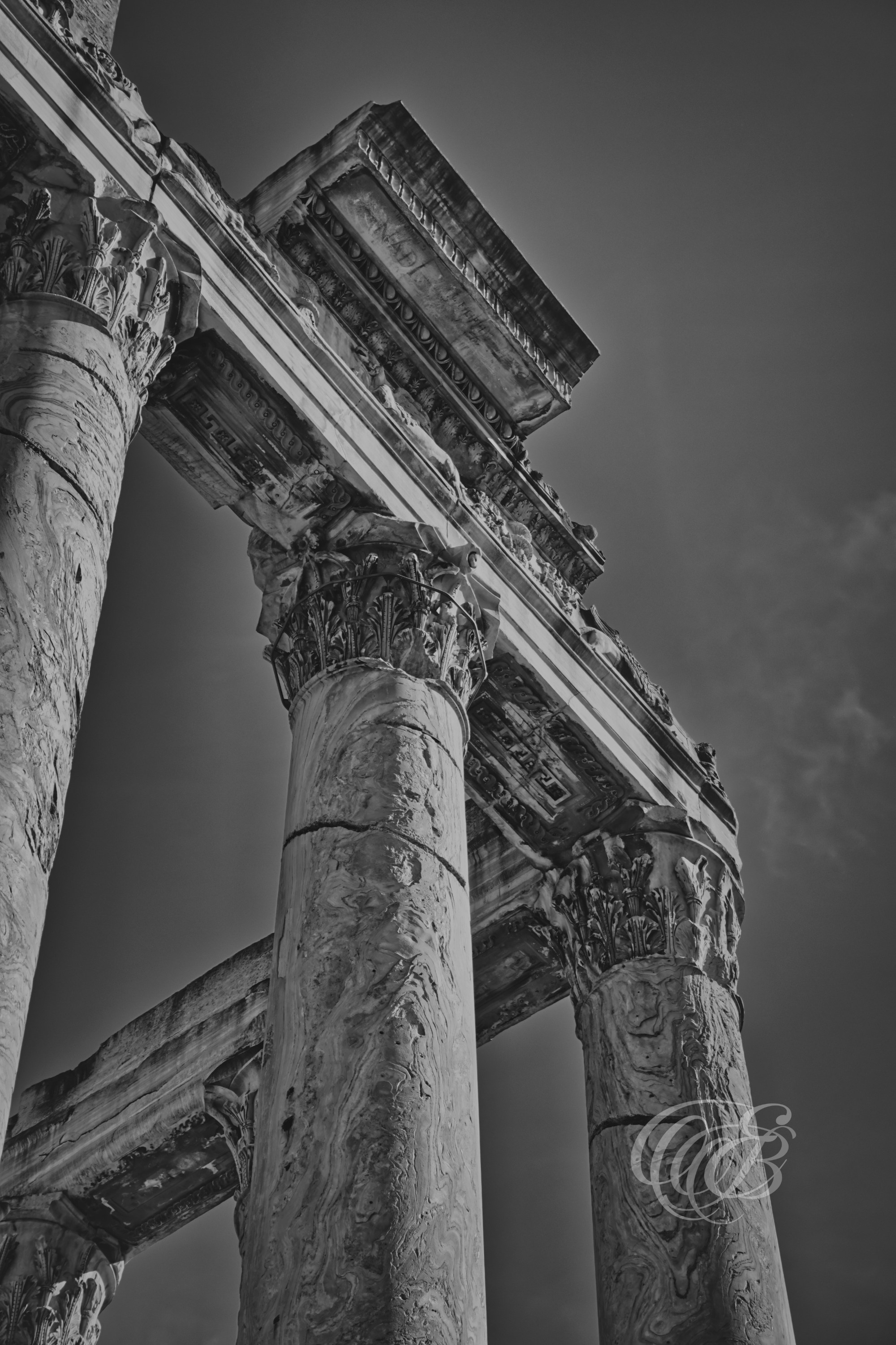 Rome Italy - The Columns of Antoninus and Faustinus - B&W Matte - Eduardo Bartoli Fine Art Photography - Black and white matte fine art photograph of the Columns of Antoninus and Faustina in Rome, Italy – photography by Eduardo Bartoli.