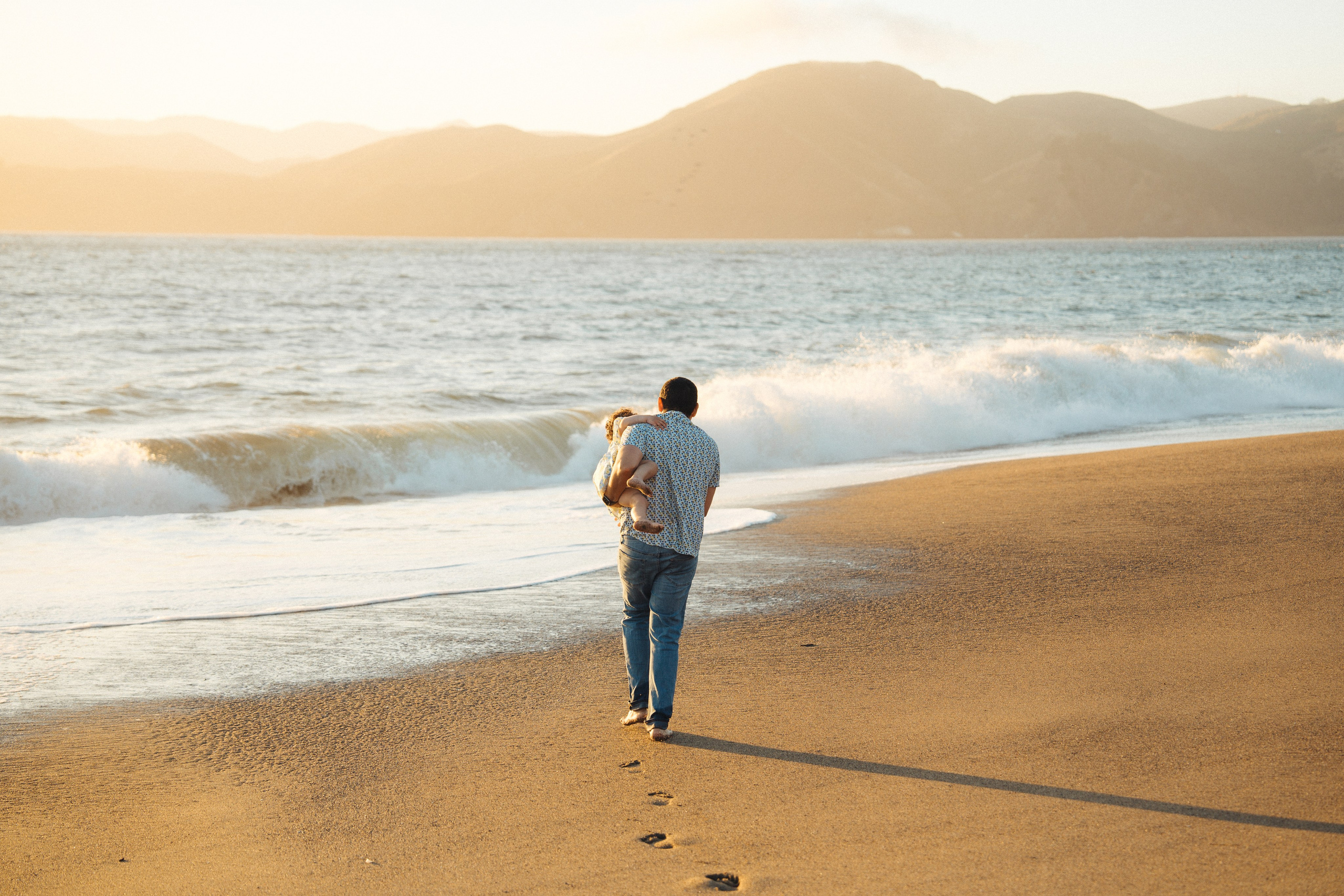 Bri’s growing family at Baker Beach. Soulo Photography | San Francisco Bay Area Based Photographer
