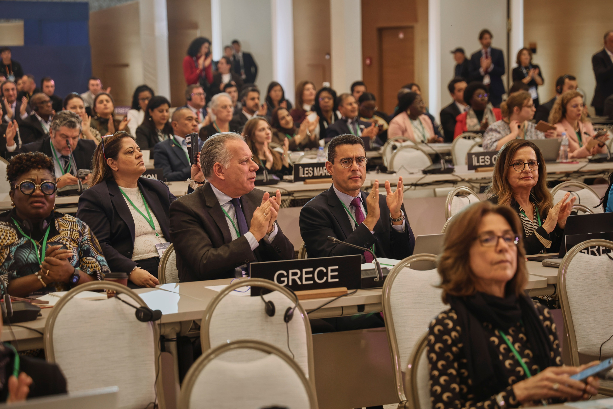 Registan square backdrop during UNESCO event in Samarkand — cultural reportage photo.