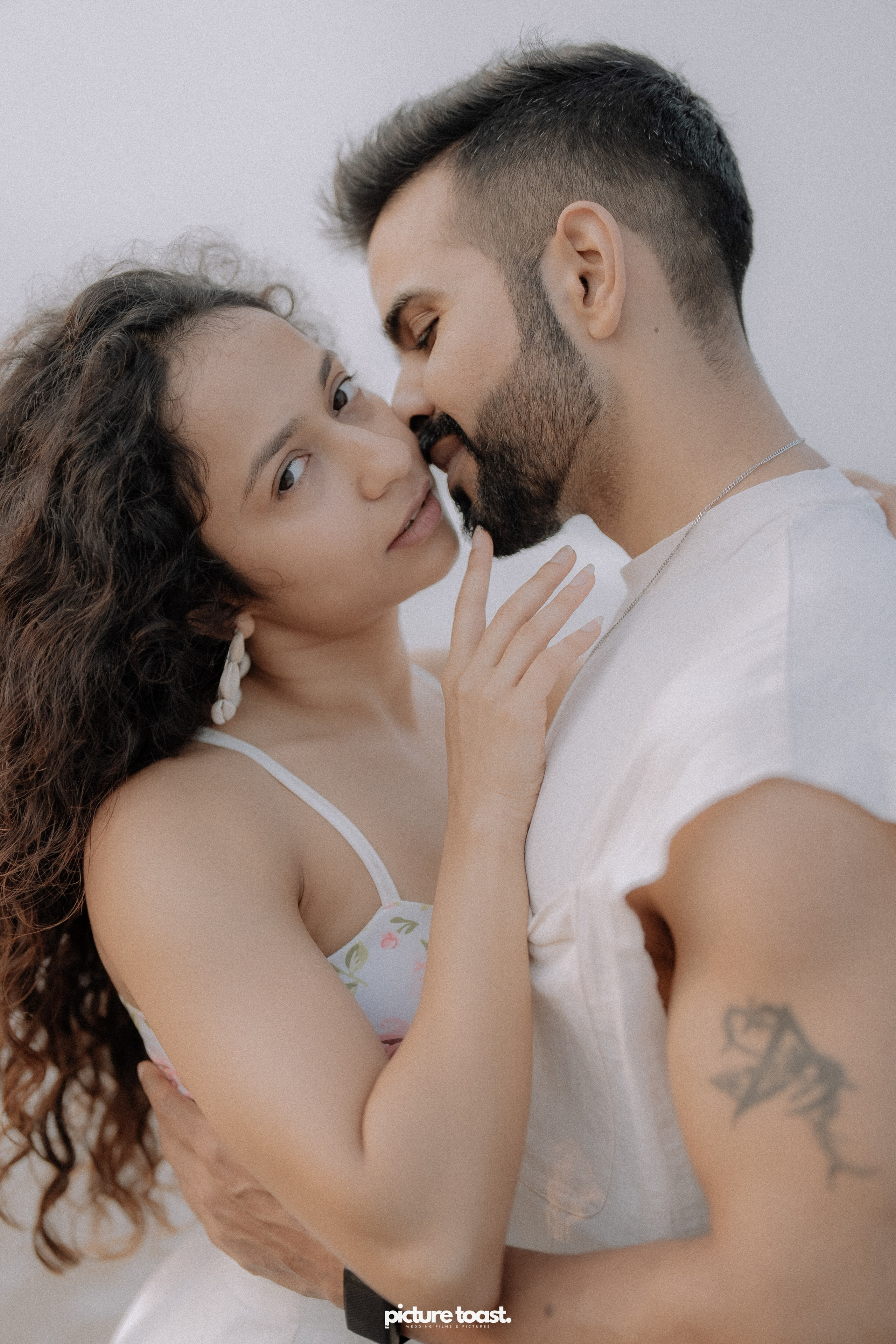 Love In The Beach. Fine art Wedding Photographers in India & Canada