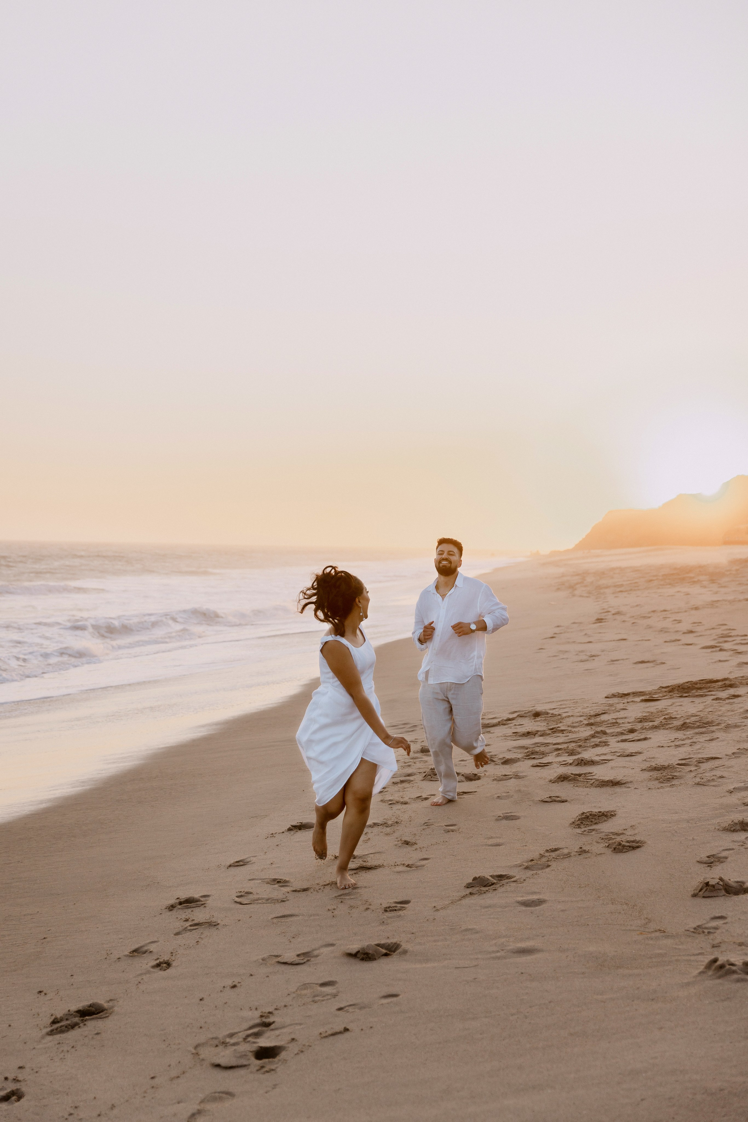 Engagement Photoshoot at Malibu Beach | Taya Frank. Southern California Family and Couple Photographer