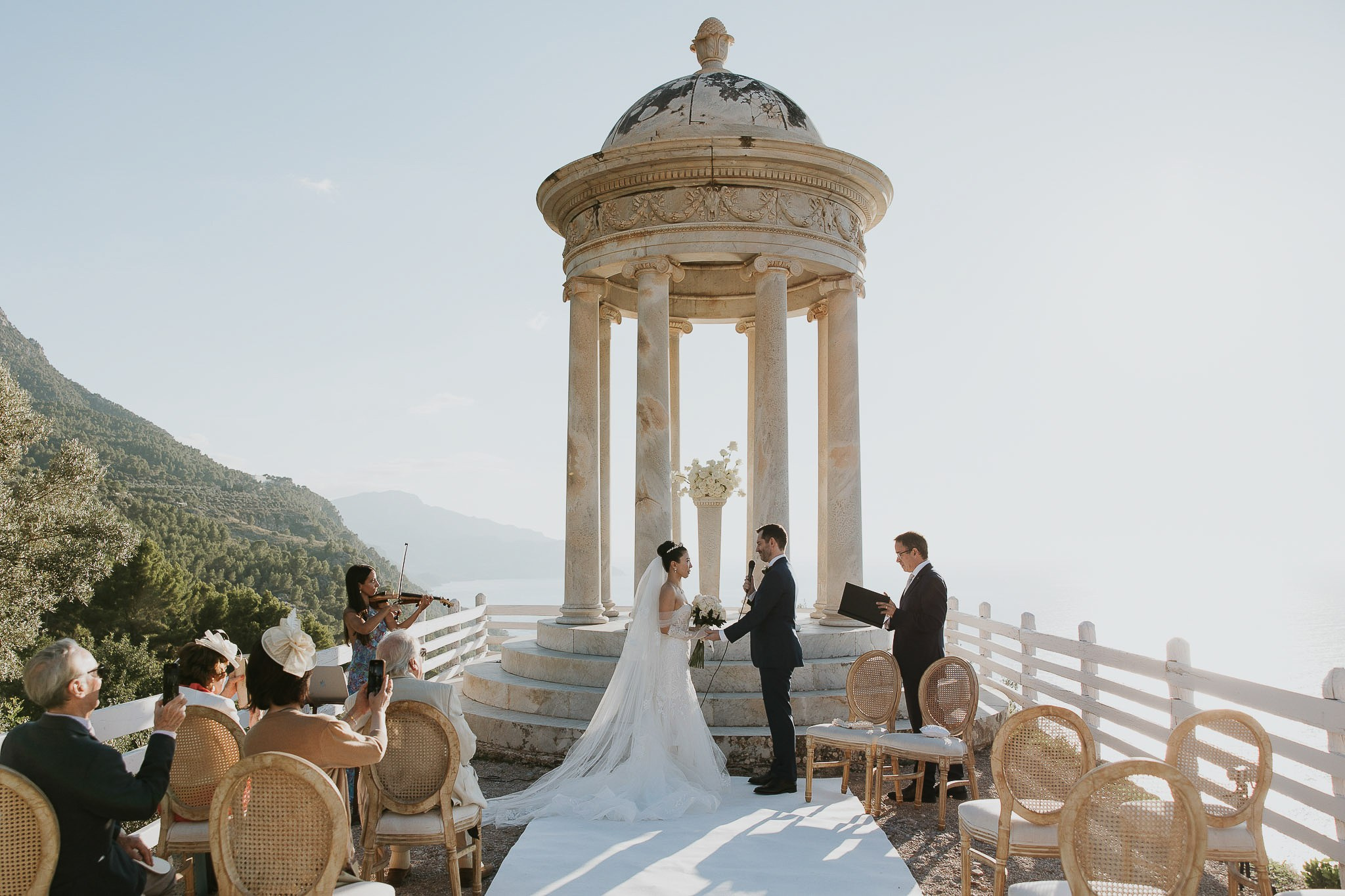 Bride laughing during wedding vows Son Marroig