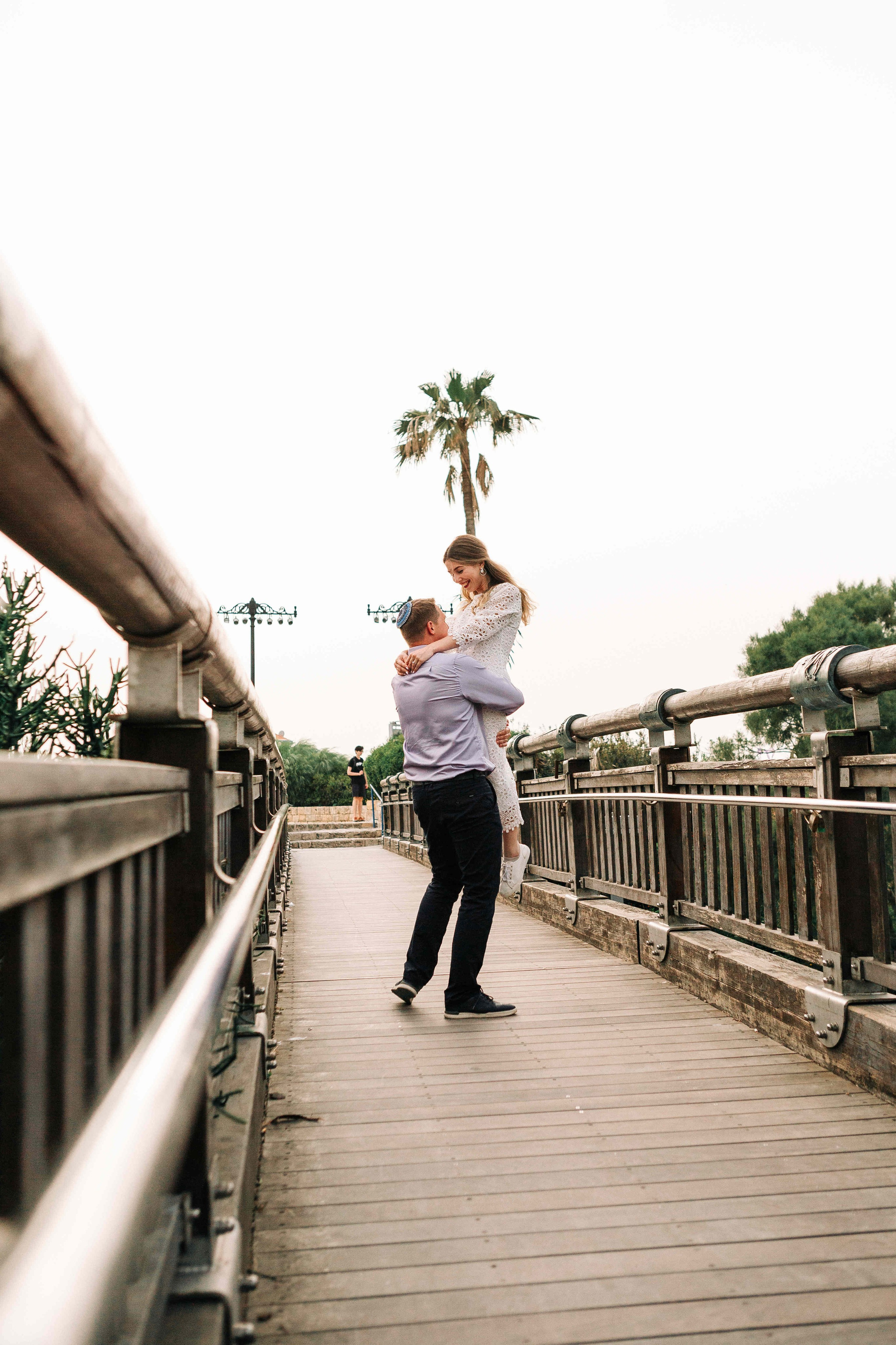 LOVERS IN JAFFO. PHOTOGRAPHER IN ISRAEL