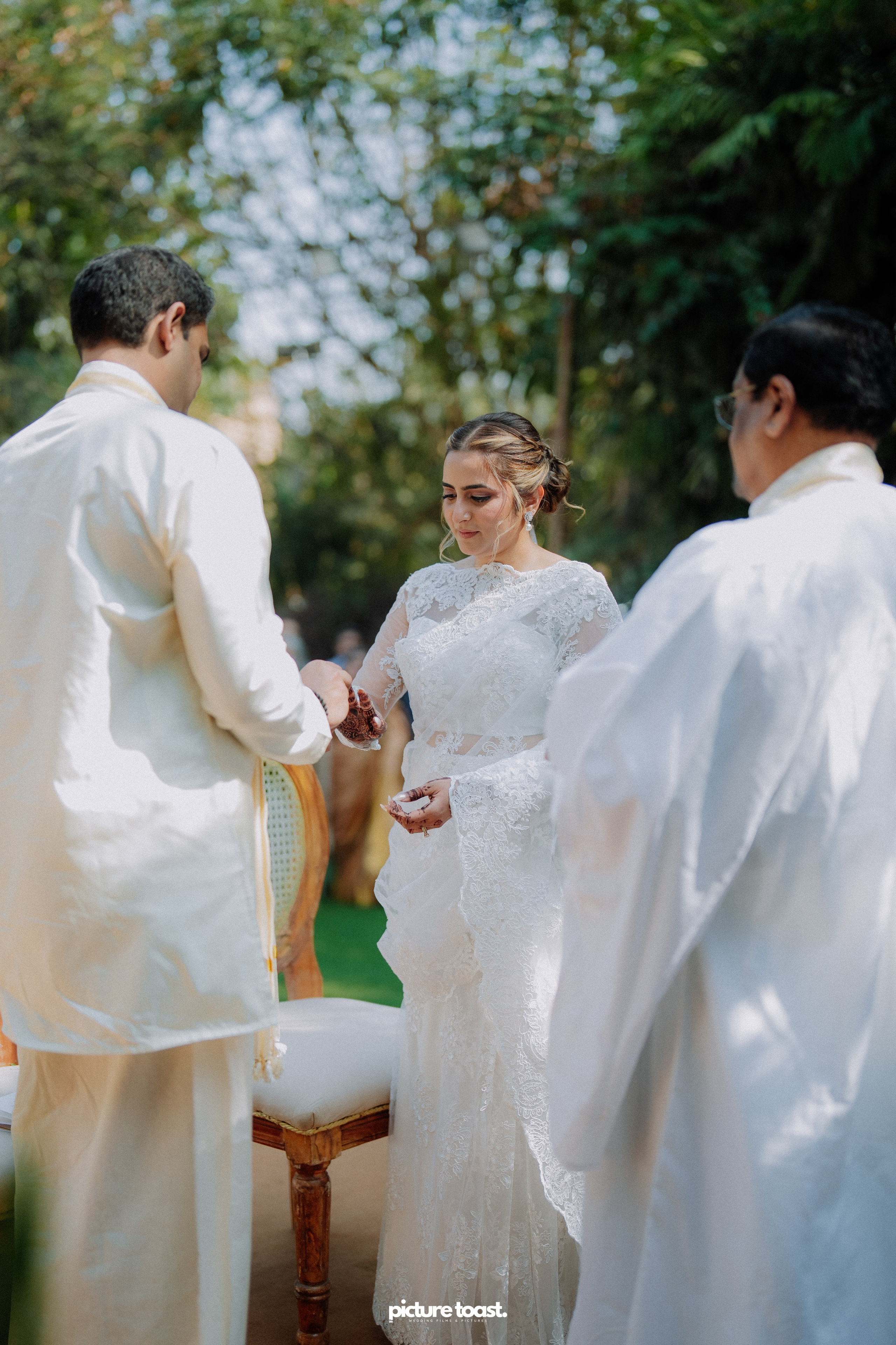 Blessing of Rajiv & Aashna. Fine art Wedding Photographers in India & Canada