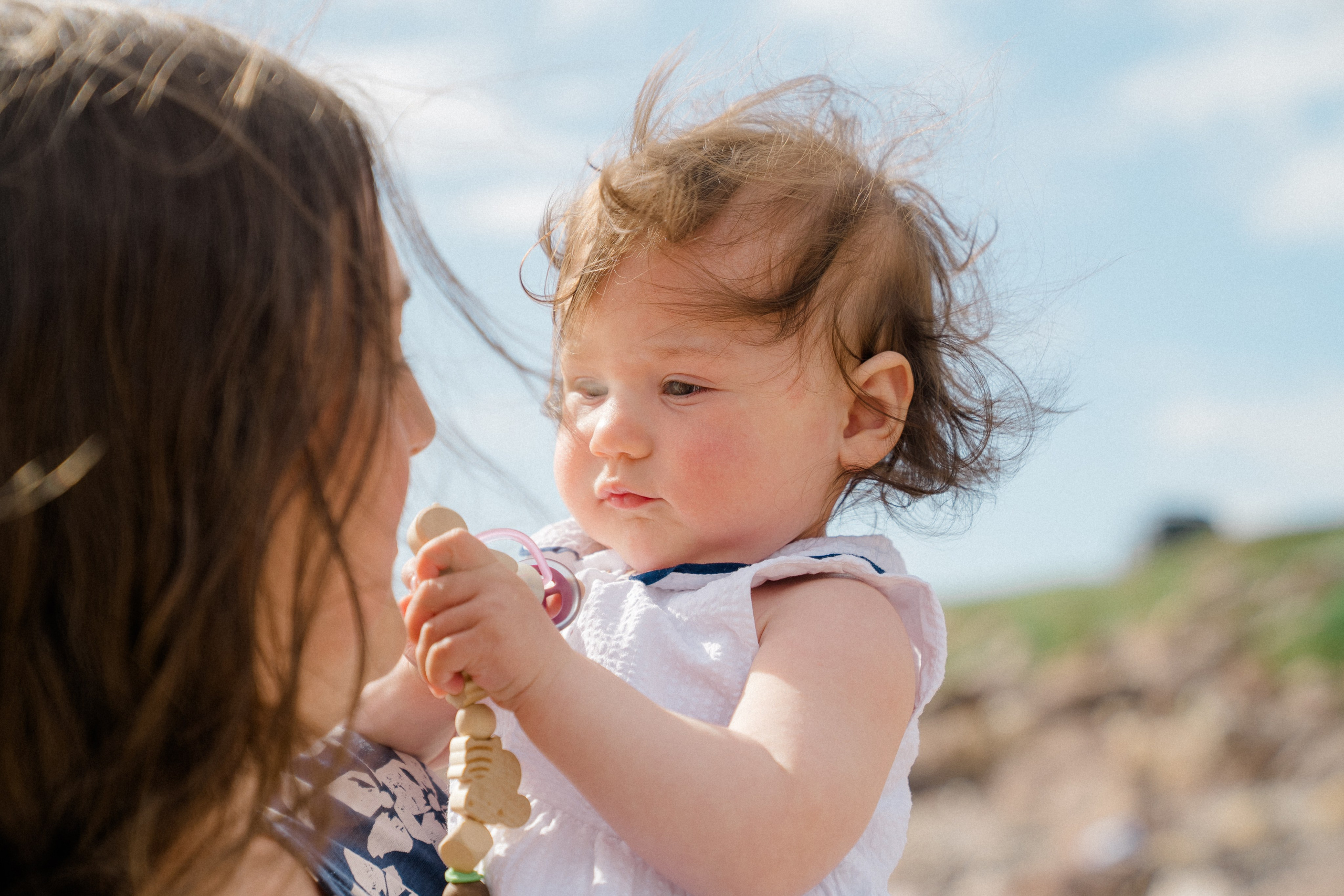 Darya and Mia at the ocean. Wedding and family photographer Ireland
