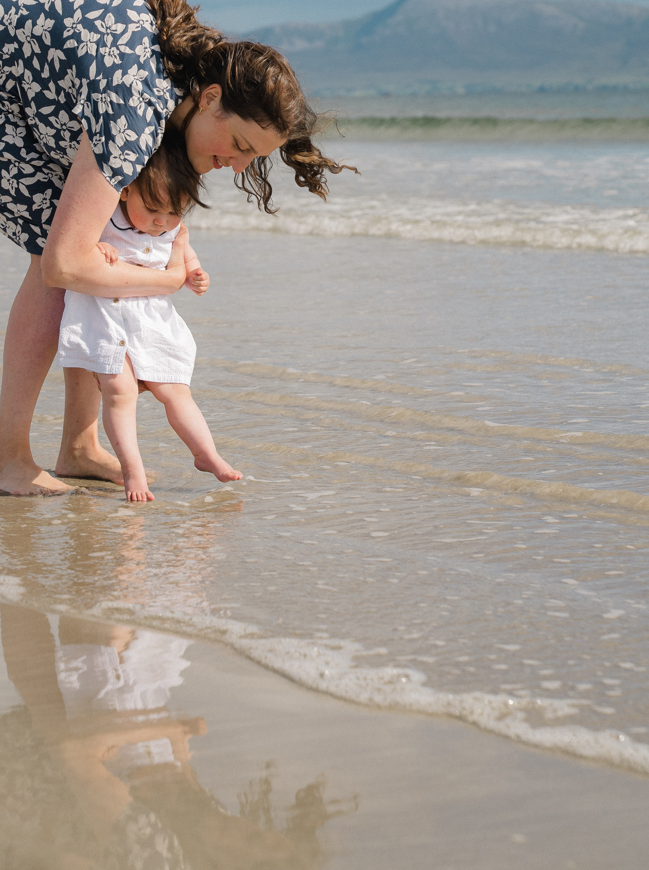 Darya and Mia at the ocean. Wedding and family photographer Ireland