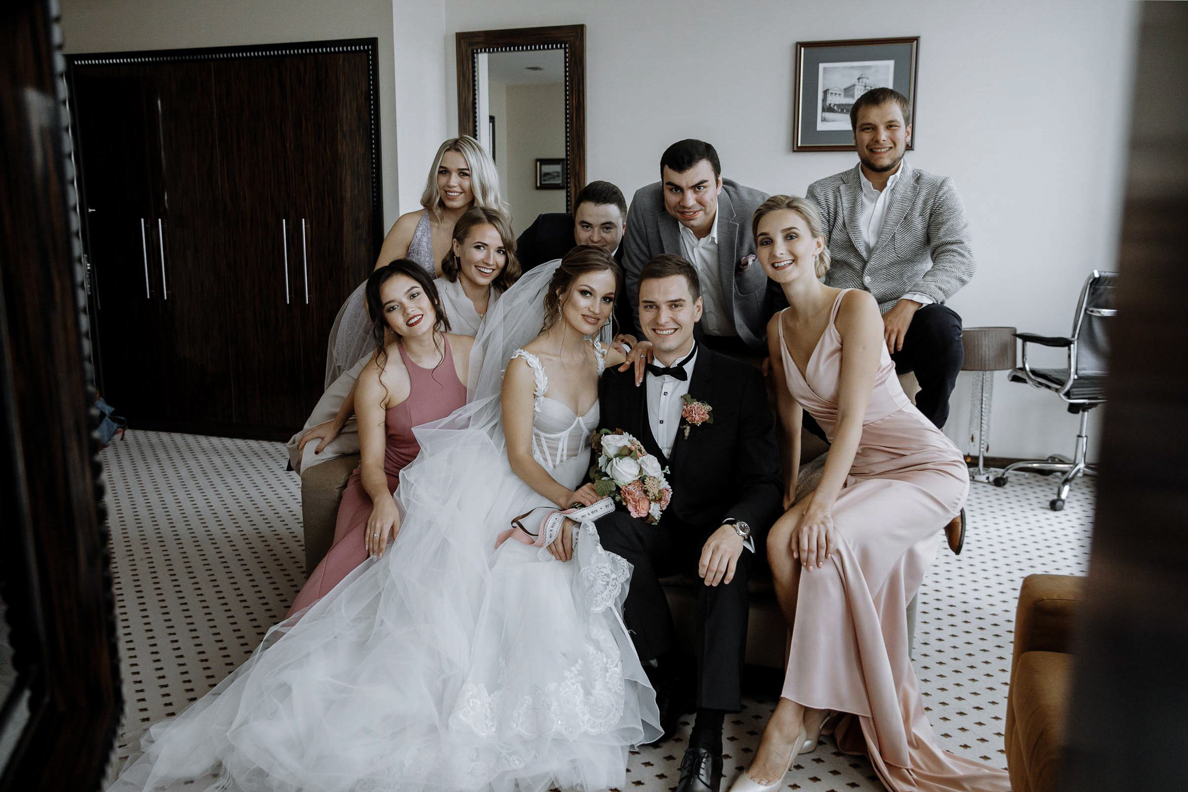 Bride and groom portrait with party, by Tanya Bodgan, Cornwall wedding photography.  