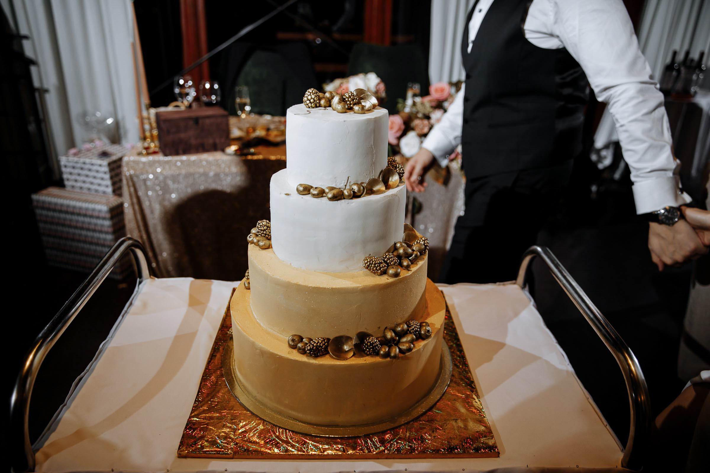 Wedding cake in soft light, by Tanya Bodgan, Bude wedding photography.  