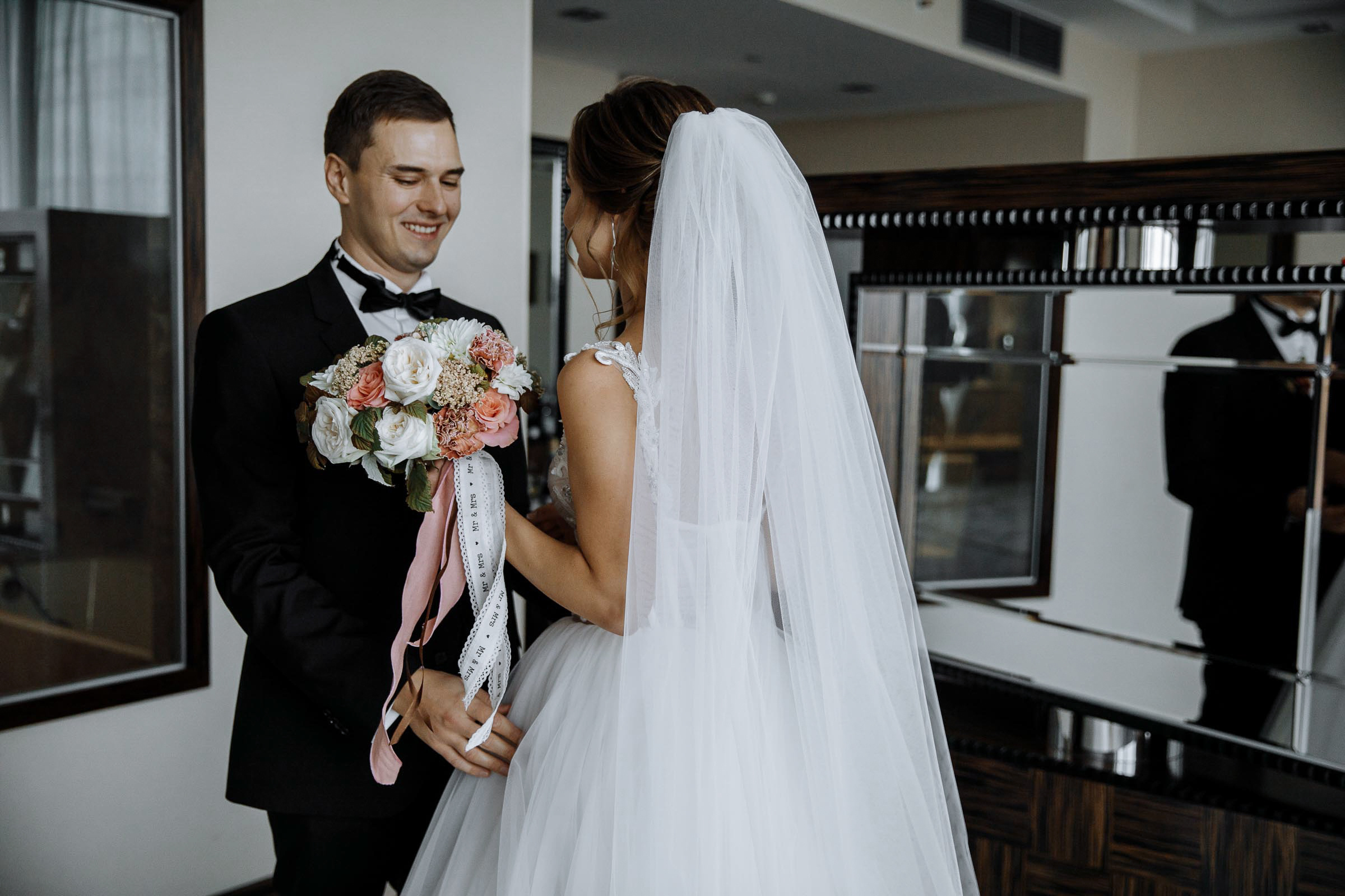 Bride and groom first look, by Tanya Bodgan, Bude, Cornwall wedding photographer.  