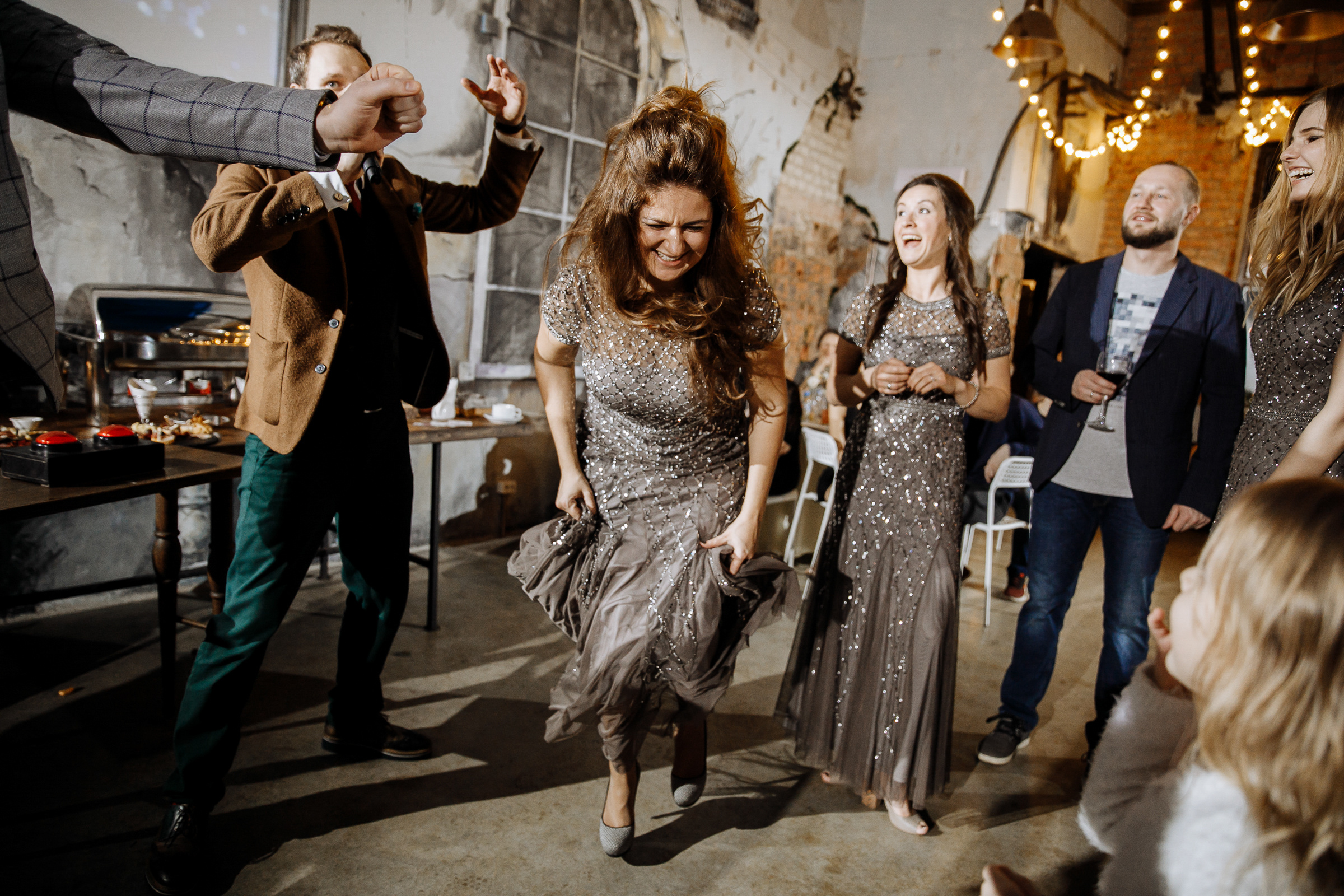 Bridesmaids dancing fun, by Tanya Bogdan, Bude wedding photography.  