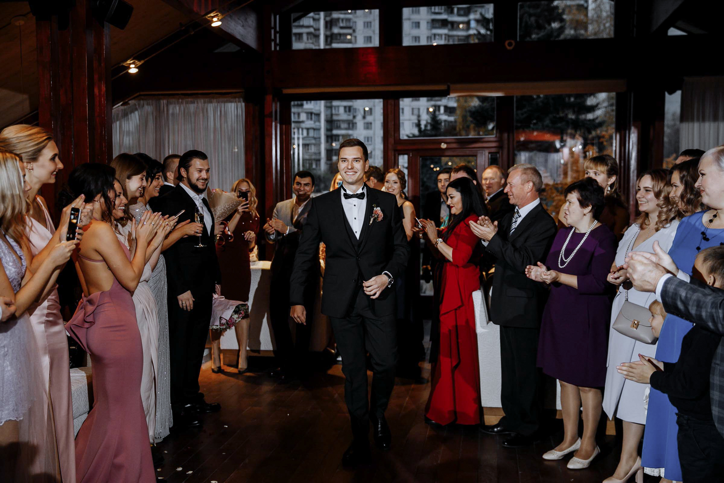 Groom walking down aisle in hotel venue, by Tanya Bodgan, Bude, Cornwall wedding photographer.  