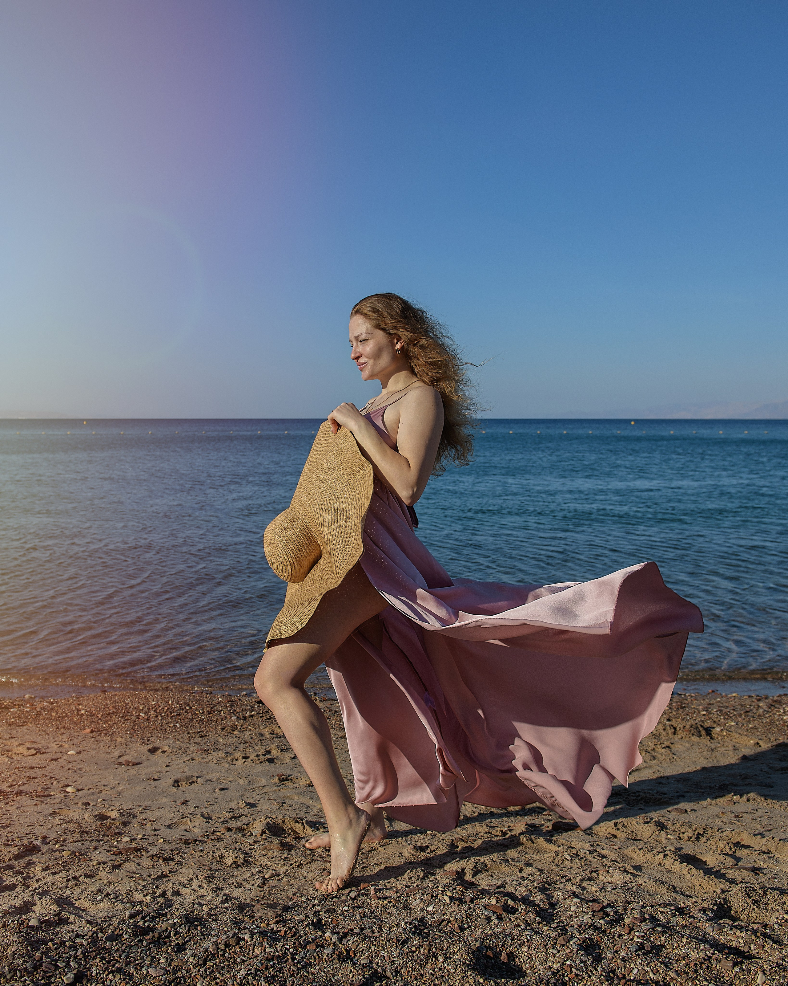 Julia & Dmitriy pregnancy photoshoot on the Red seacoast. צלמת משפחה ילדים הריון וסיפורי אהבה באילת ישראל אולגה אמצ'יסלבסקי