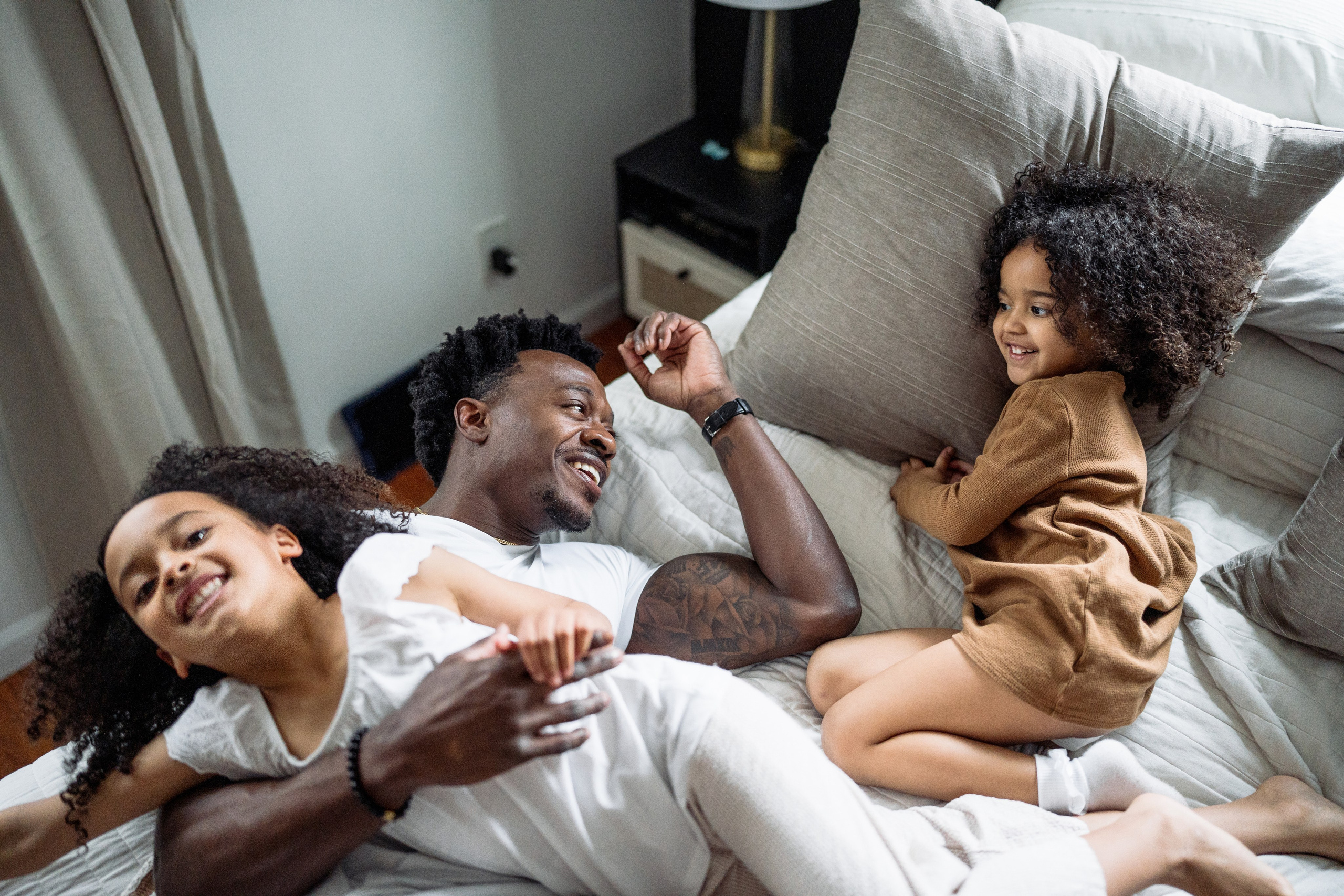 Stephanie, Lamar and kids at home. Wedding and family photographer and videographer PA, NJ, NY, DE, MD