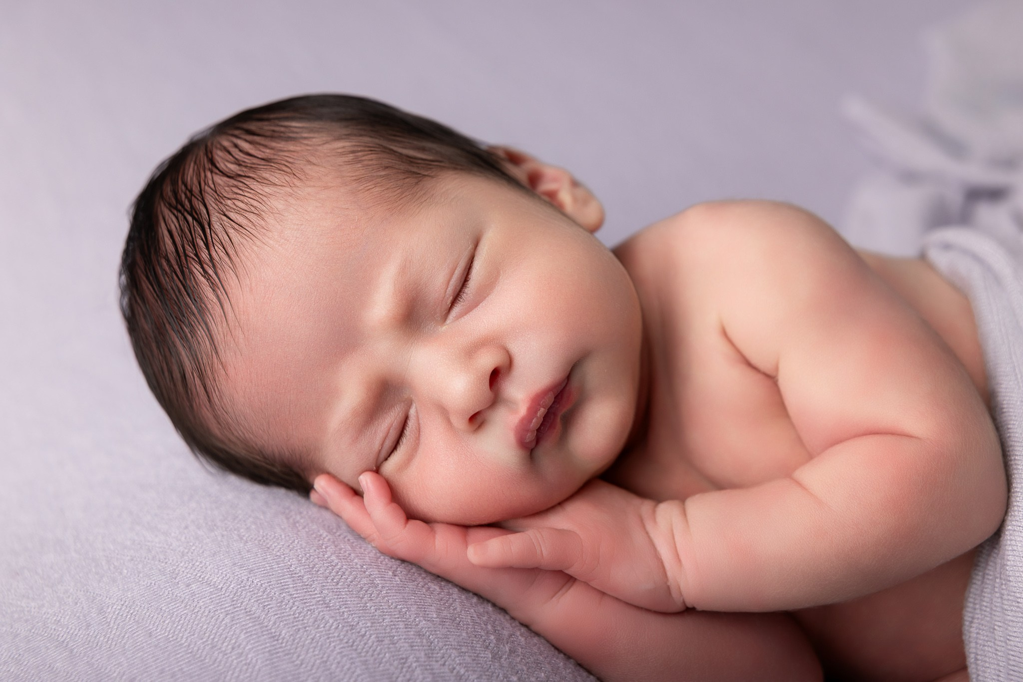 Angel Newborn Photoshoot. Professional family, maternity & newborn photographer in North Charleston, SC, creating timeless portraits