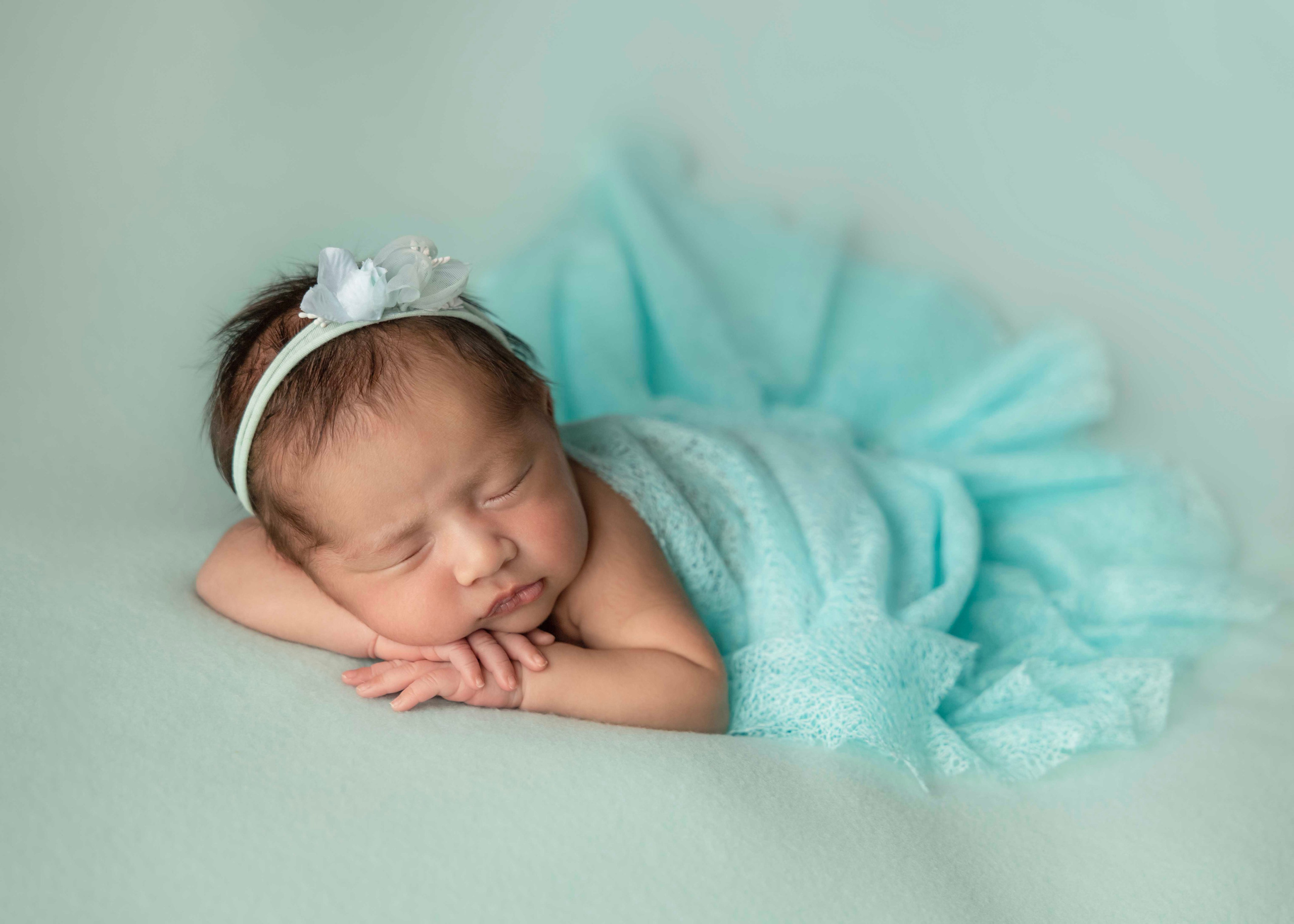 chin on the hands baby photo