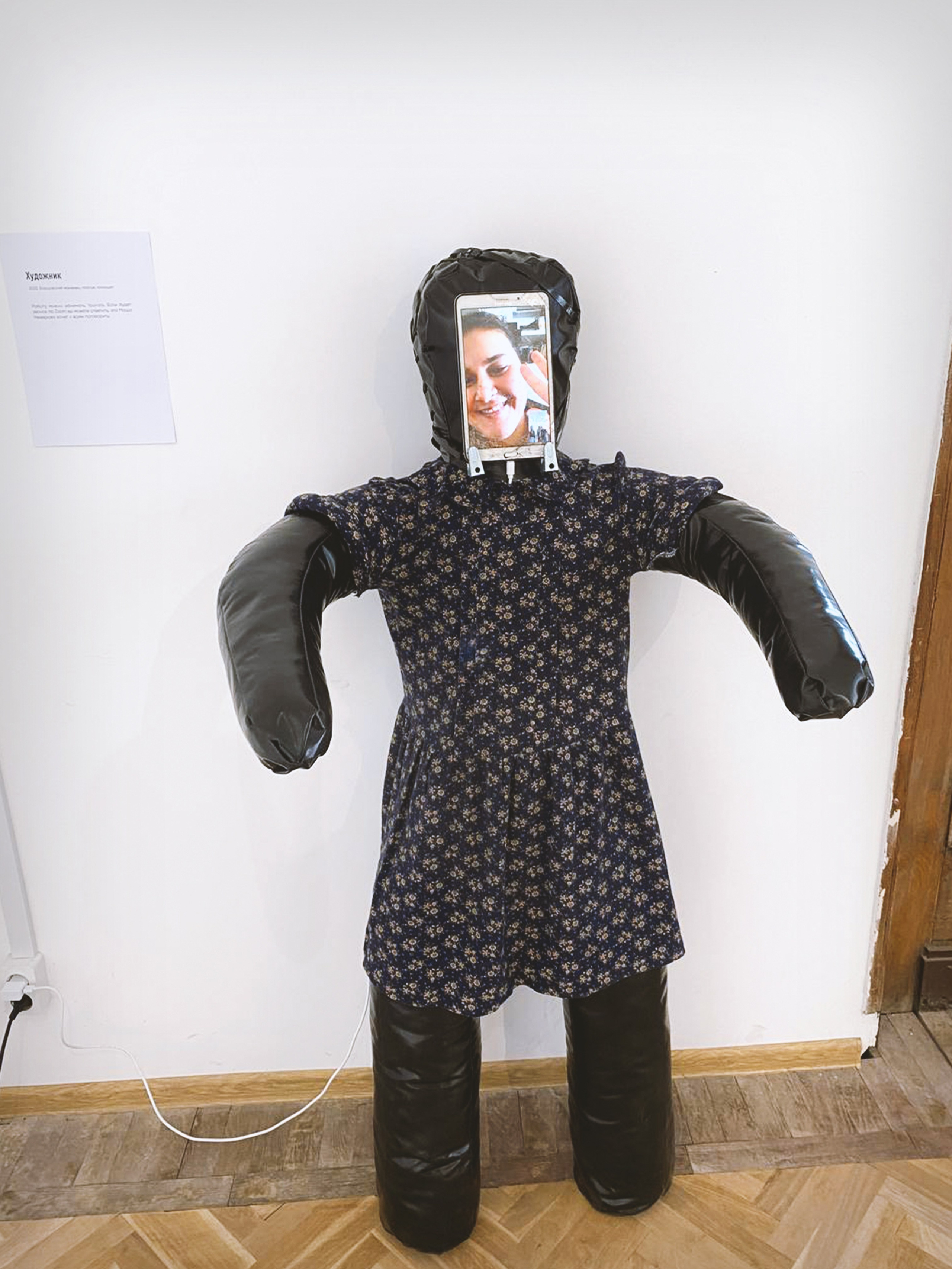 'Artist', 2022. mannequin 160 cm, dress, tablet Work can be hugged, or touched. If it will be a video call on the tablet you can answer,it’s Masha Neverova who wants to talk to you.