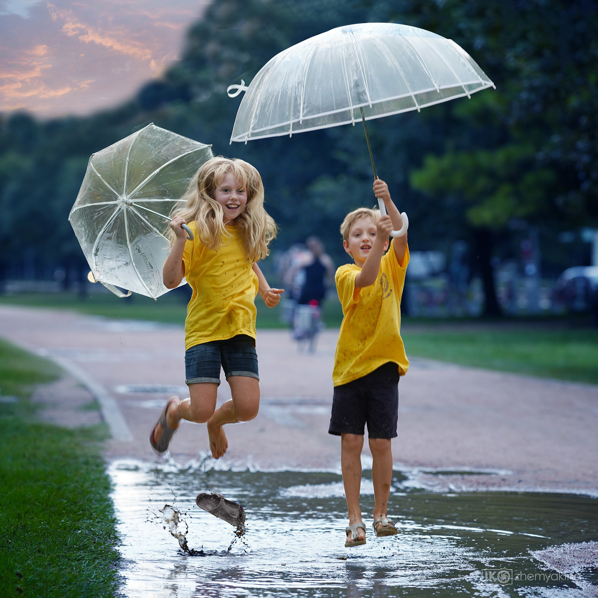 Children-in-a-puddle. Photographer Irina Kozhemyakina. Houston