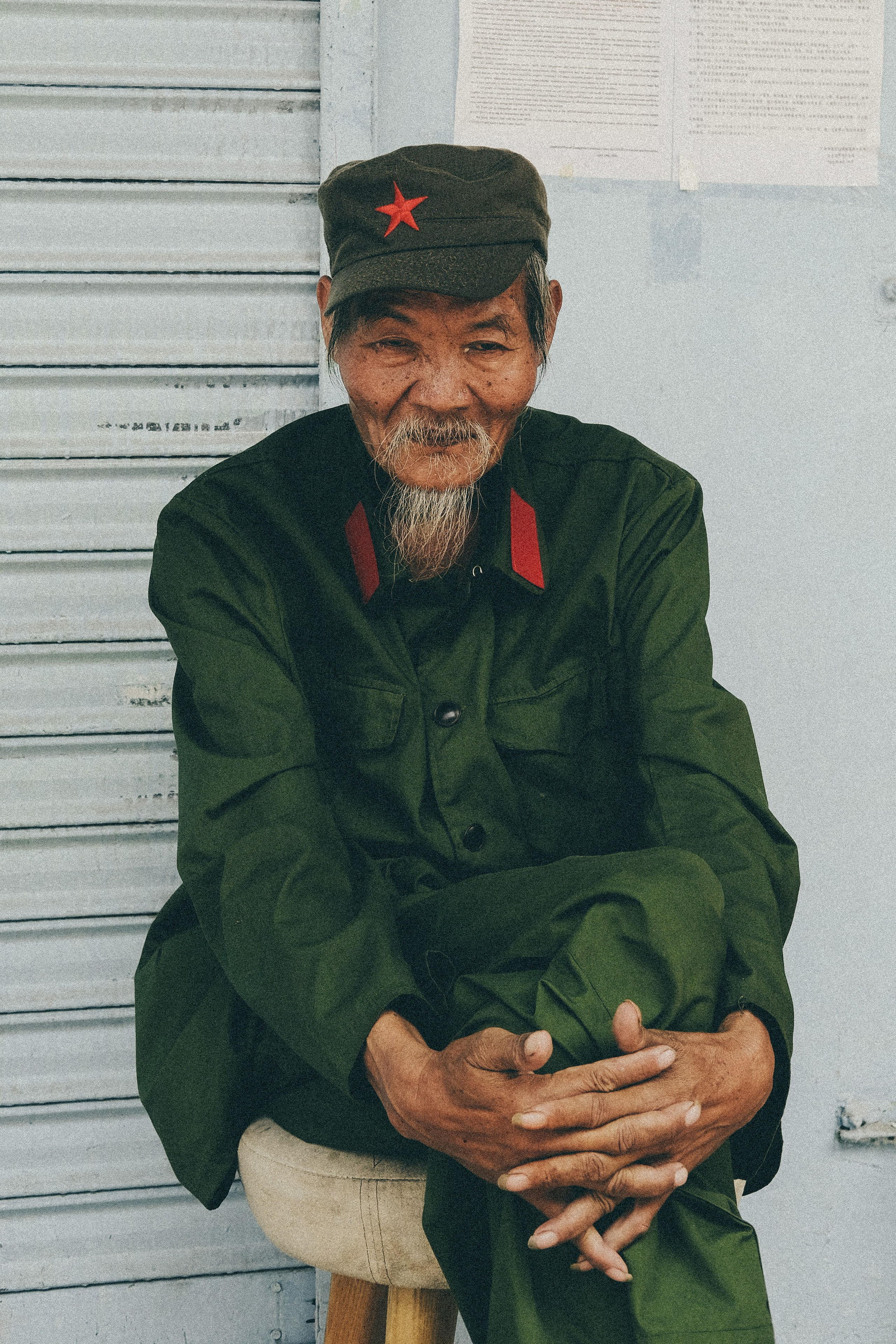 Candid Street Photo of Chinese Soldier in Guangzhou City, China