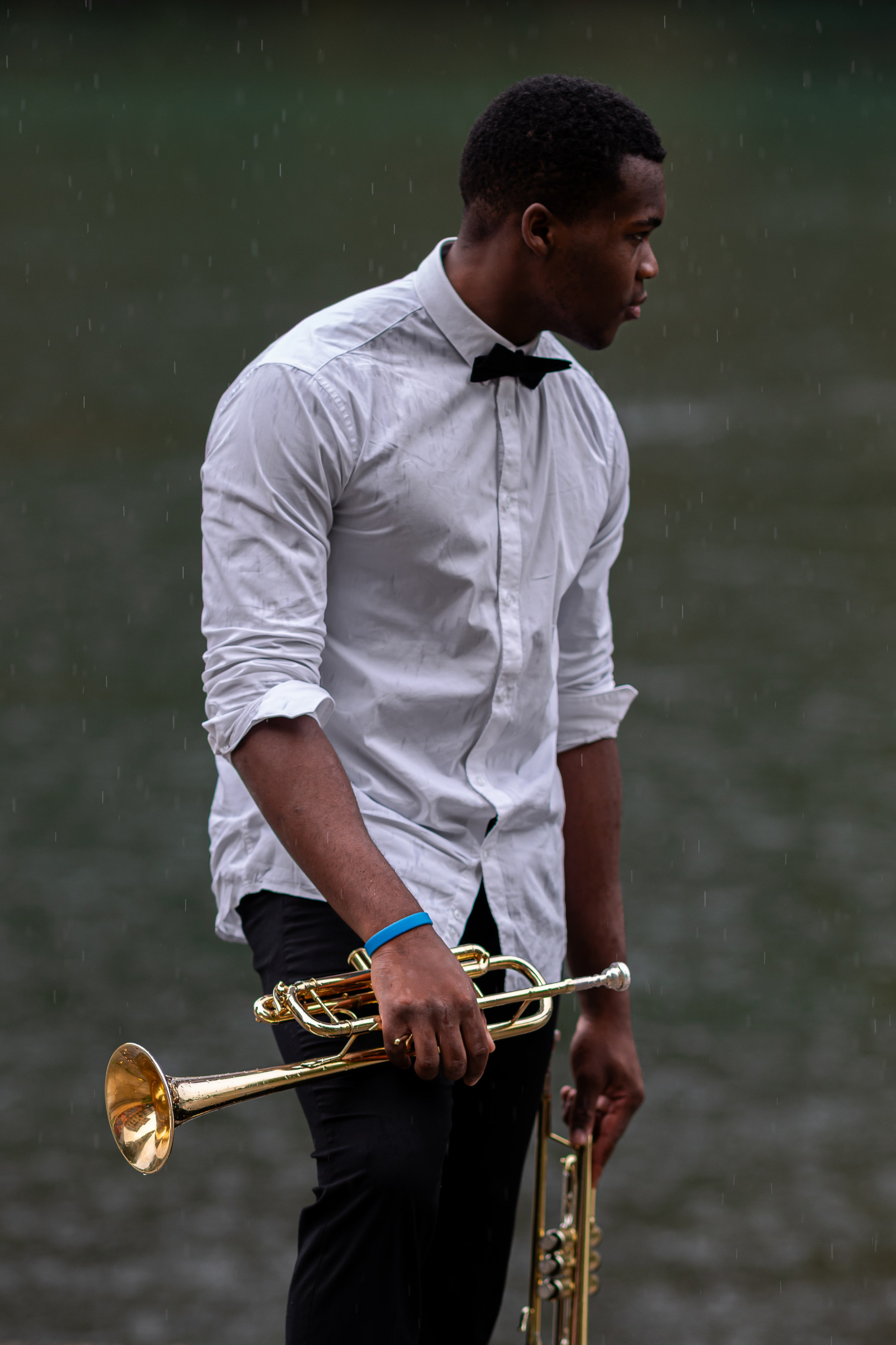 Paul-Leonard / Trompettiste sous la pluie. Photographe à Genève - Eugenia Andres