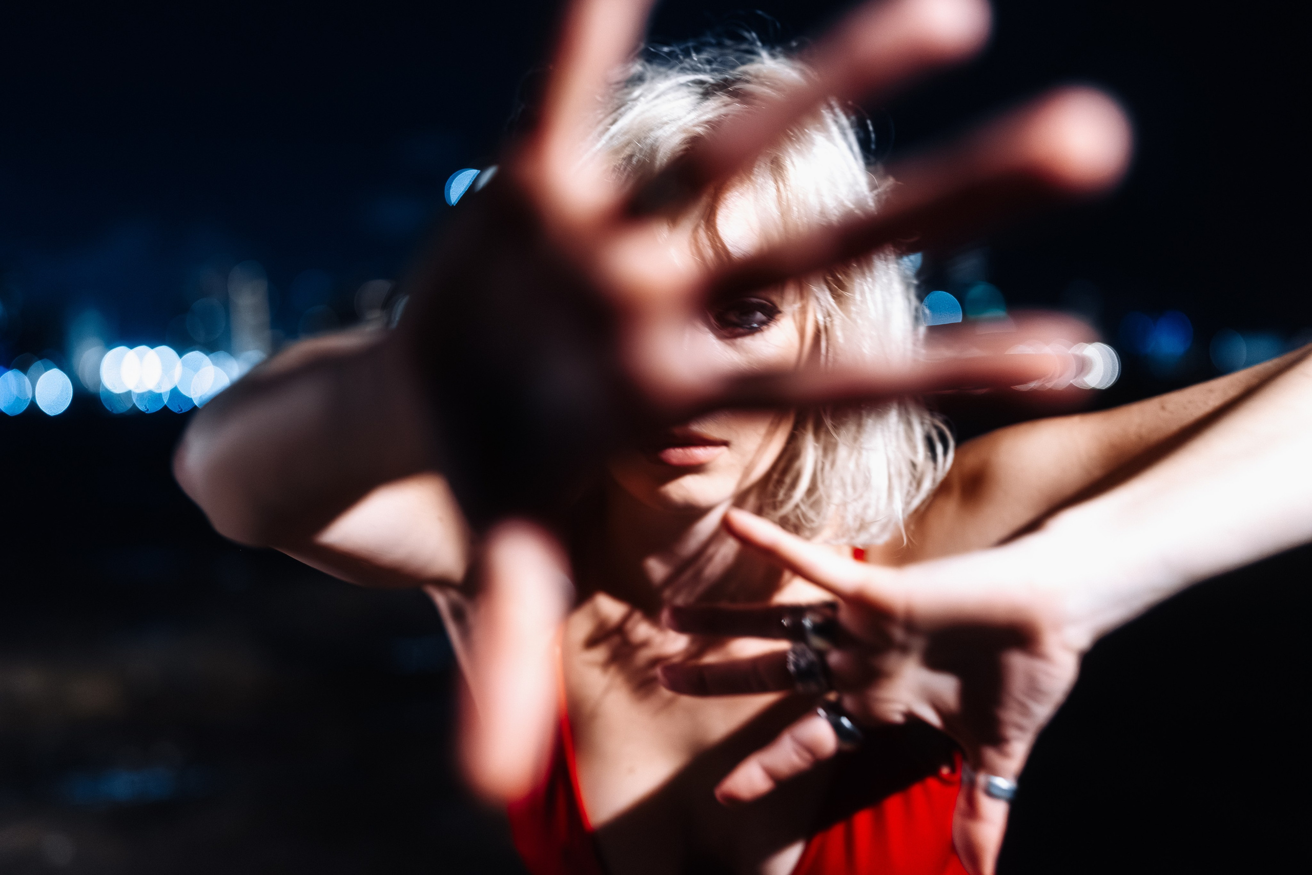 A portrait in motion: a step, wind, water. The frame has life.