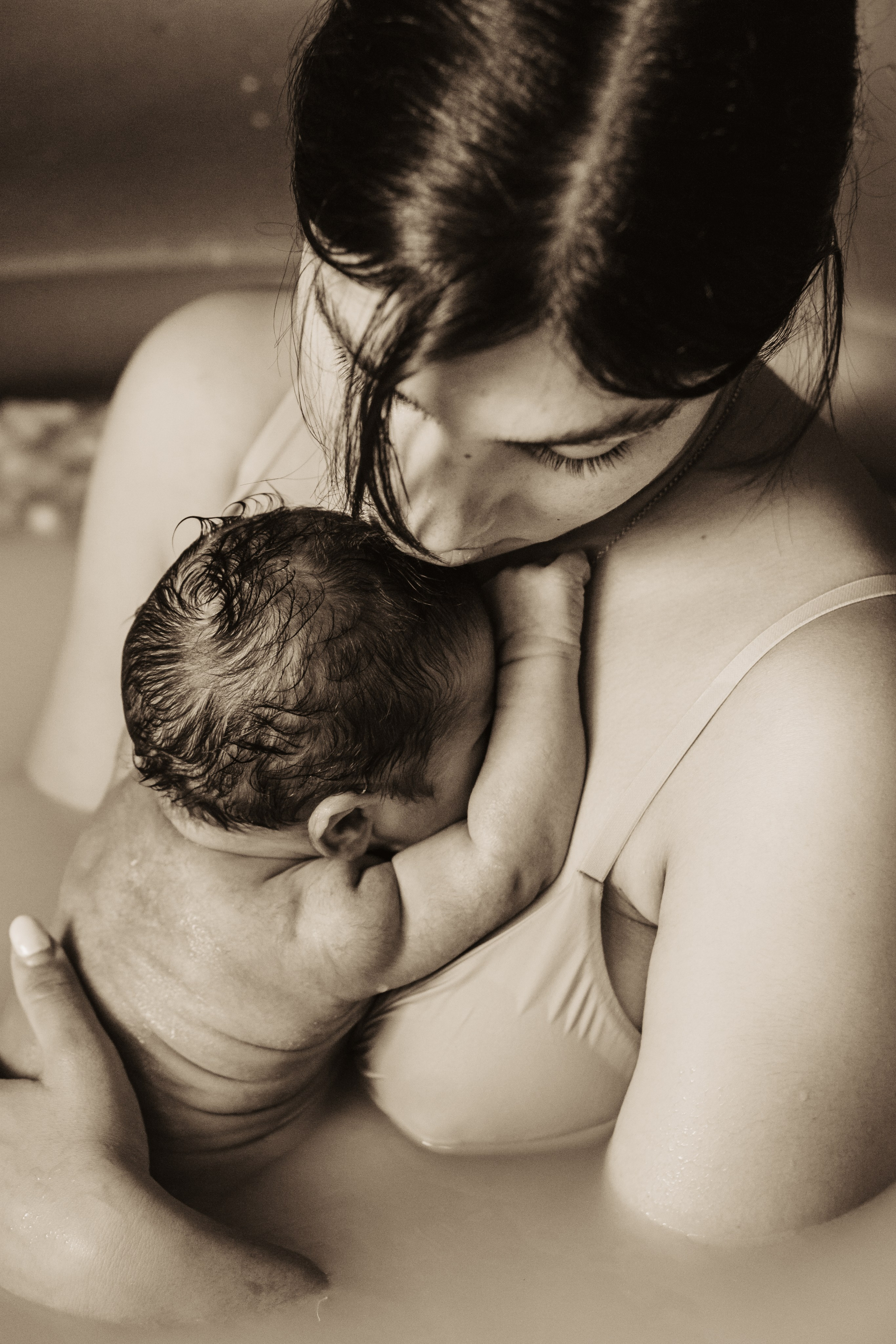 Monika, Pool newborn shooting. Family photographer Aargau Zurich