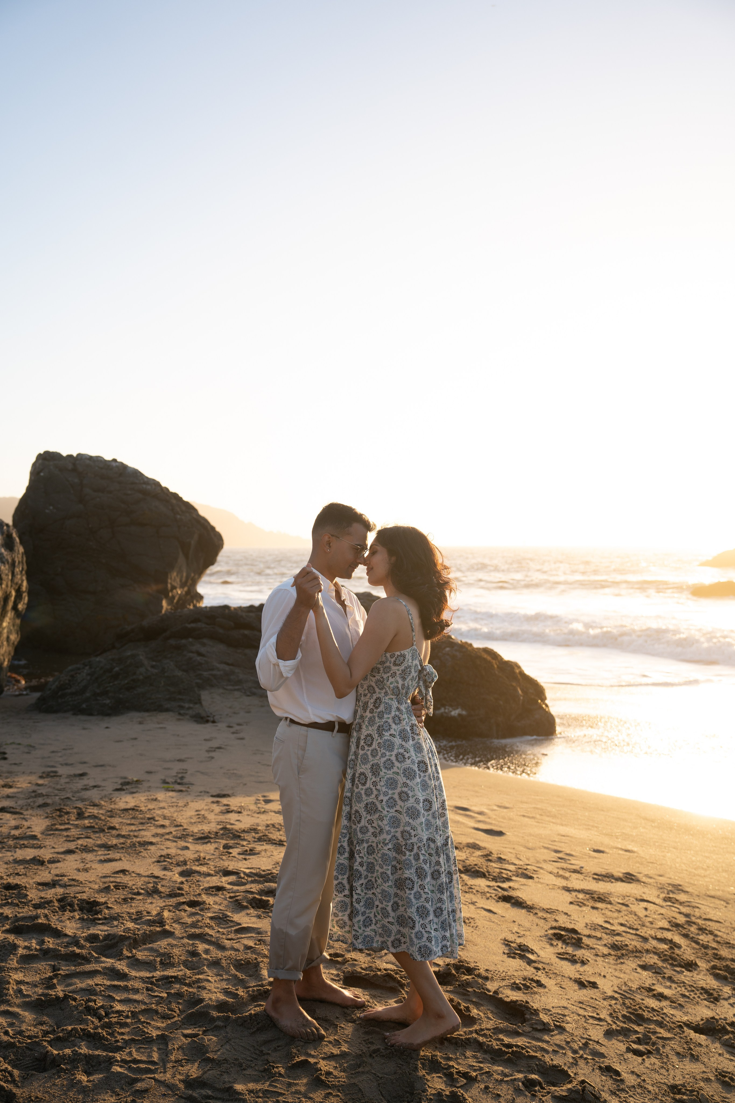 Engagement and Couple’s Photoshoot at Marshall’s Beach with iconic Golden Gate bridge view. Soulo Photography | San Francisco Bay Area Based Photographer
