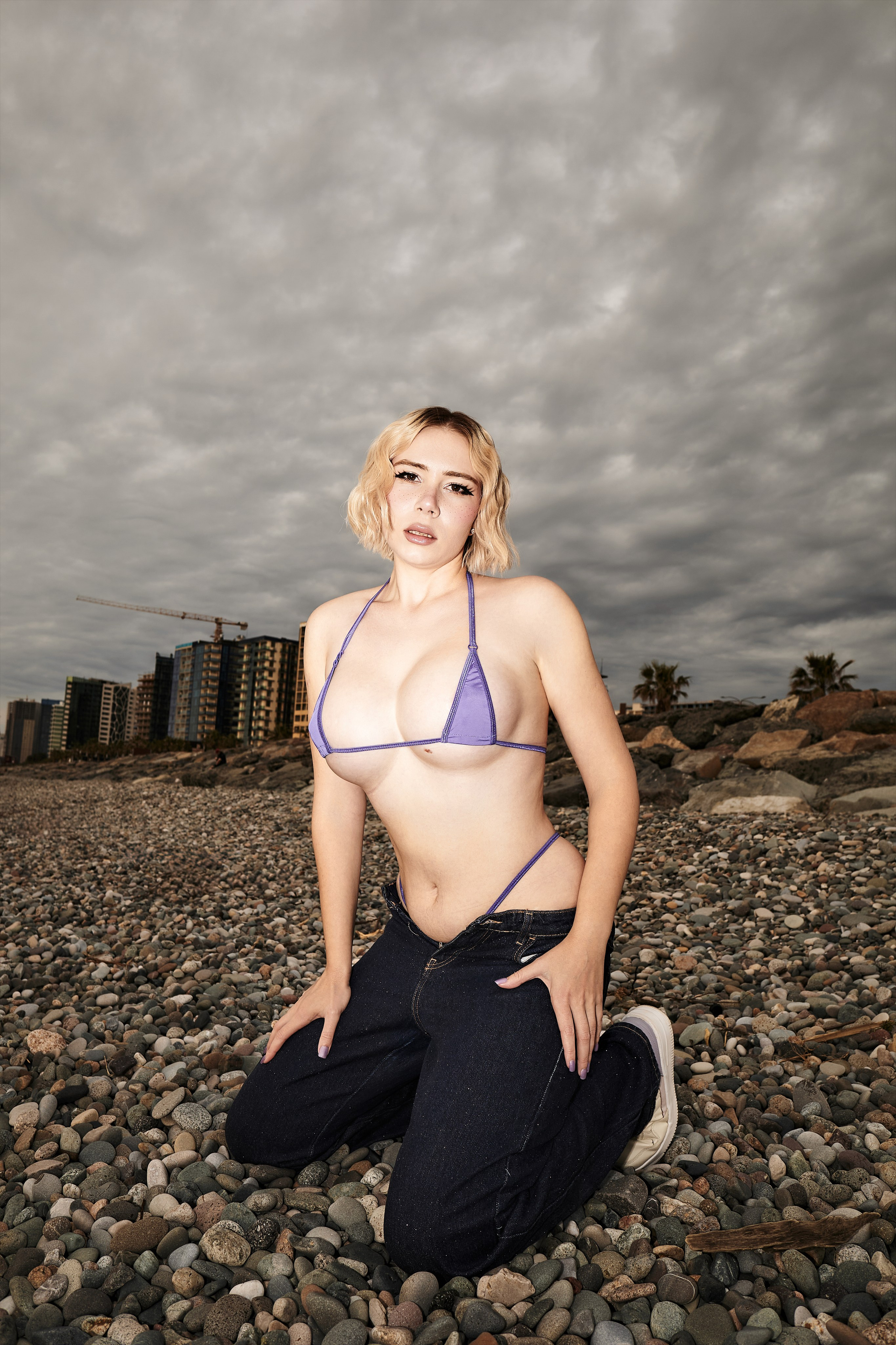 A beach photoshoot with Nona against the backdrop of an airplane in Batumi. Photographer & videographer in Tbilisi, Georgia