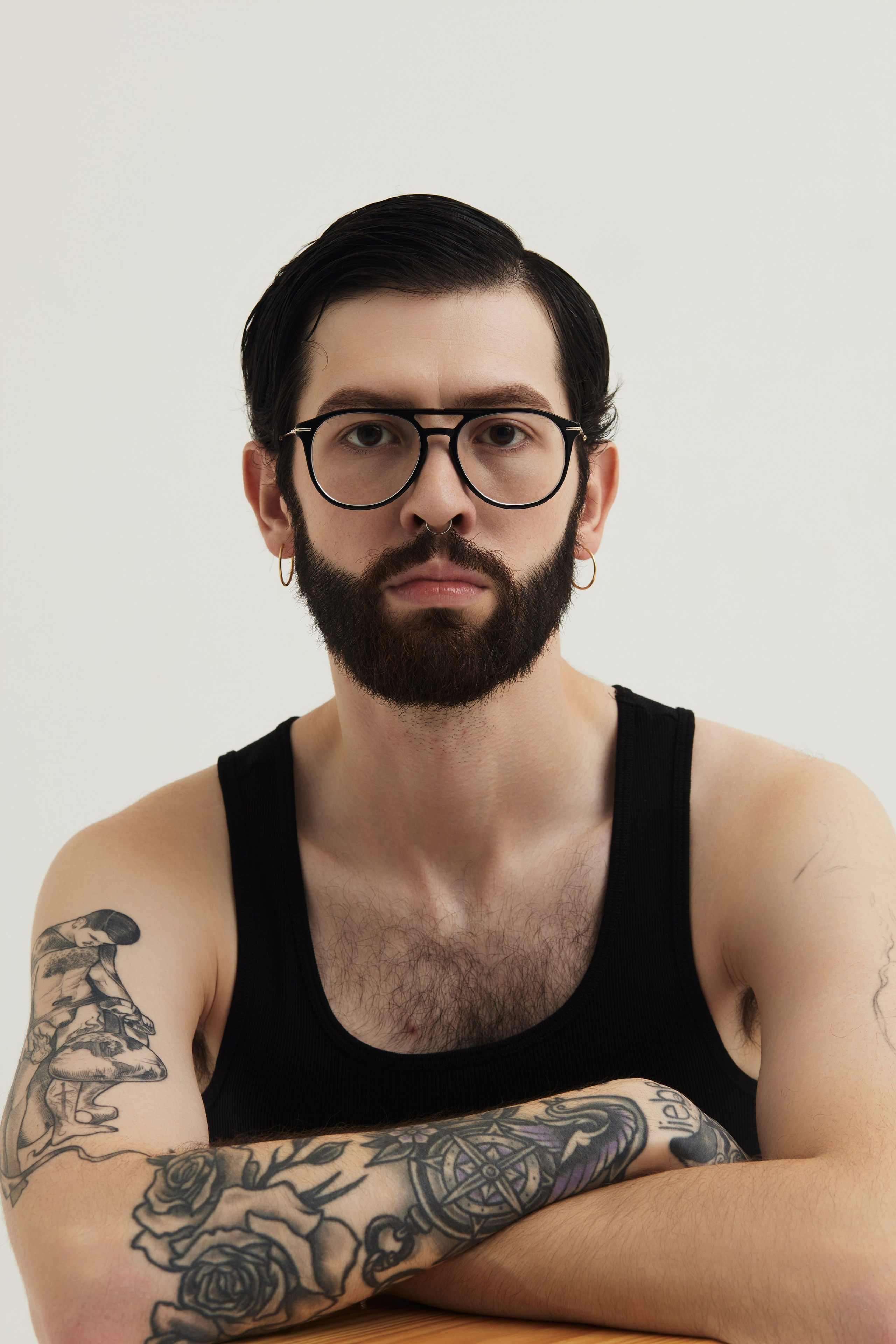 Men’s Studio Portrait: A Minimalist Style Against a White Background. Photographer & videographer in Tbilisi, Georgia